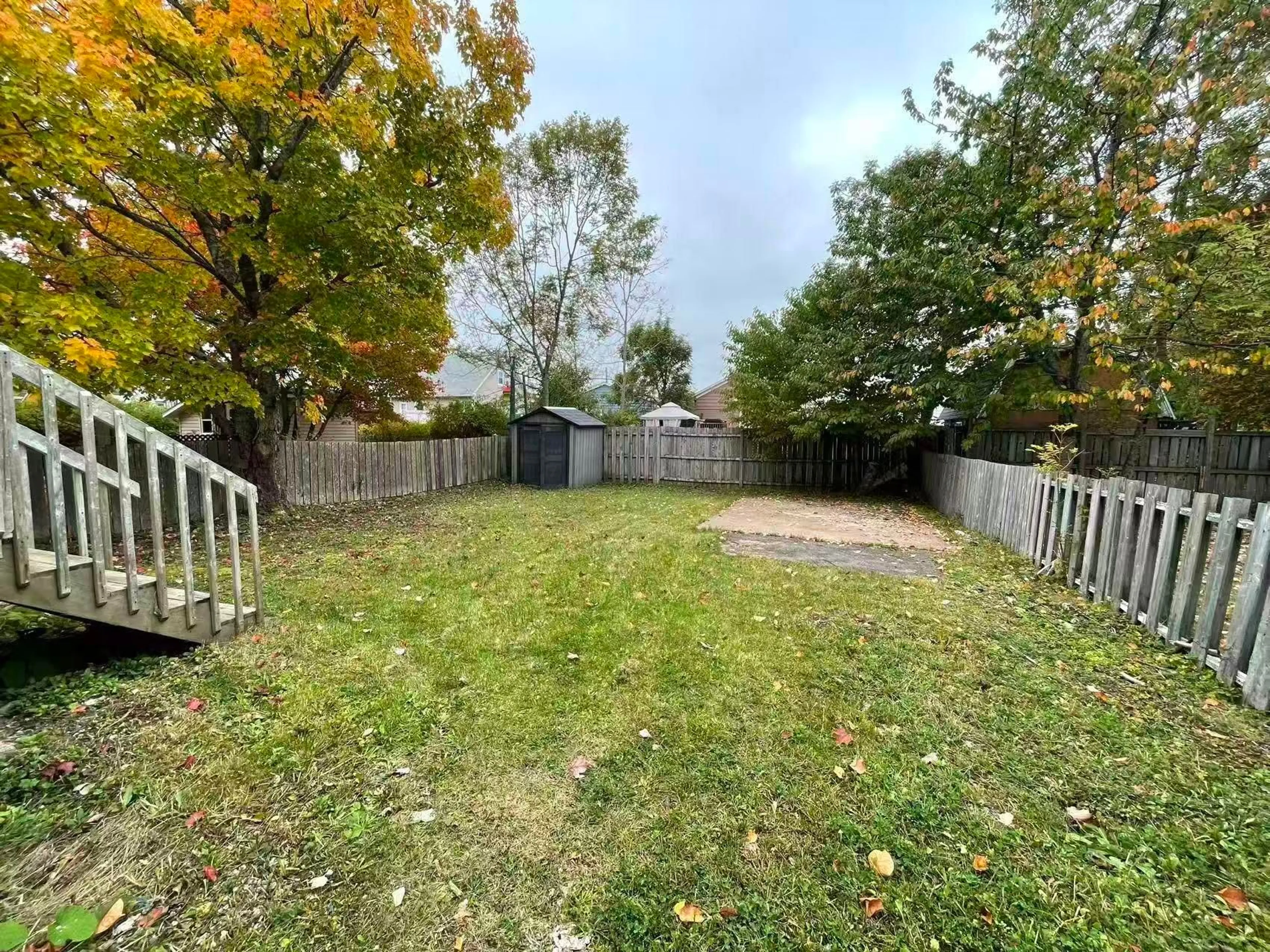 A pic from outside/outdoor area/front of a property/back of a property/a pic from drone, forest/trees view for 123 Lorne St, Sydney Nova Scotia B1P 4H3
