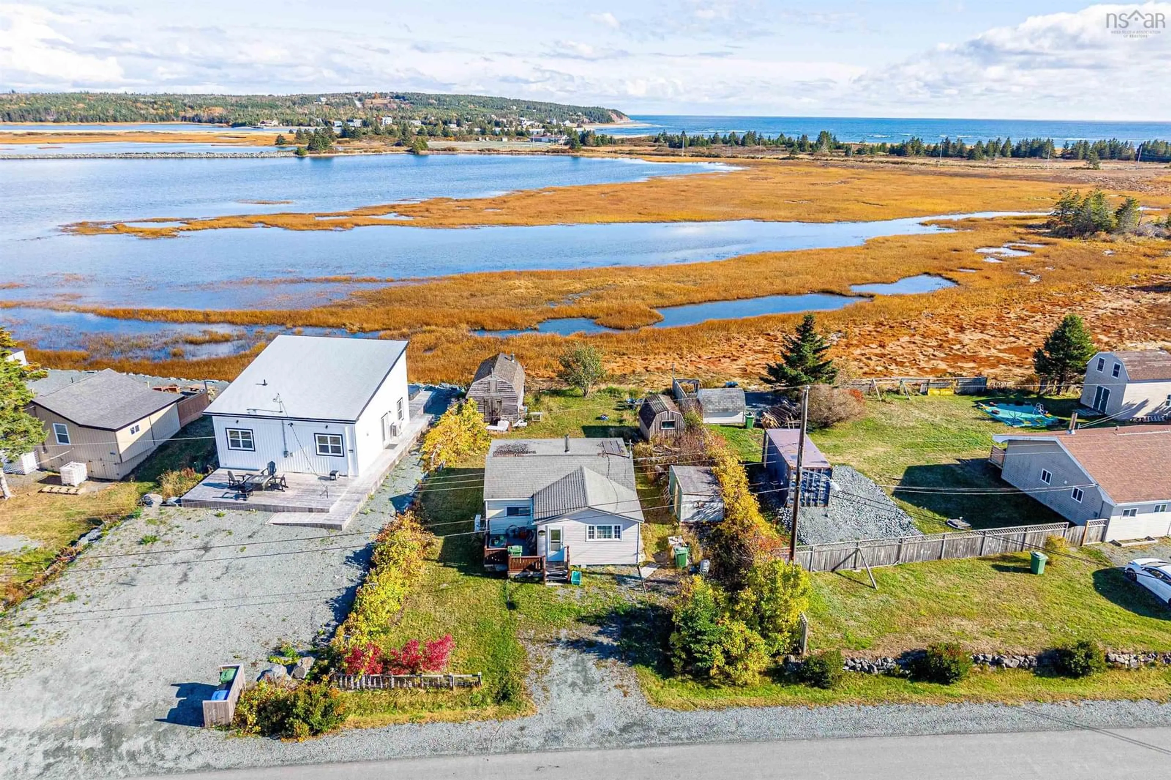A pic from outside/outdoor area/front of a property/back of a property/a pic from drone, water/lake/river/ocean view for 2327 Cow Bay Rd, Cow Bay Nova Scotia B3G 1K8
