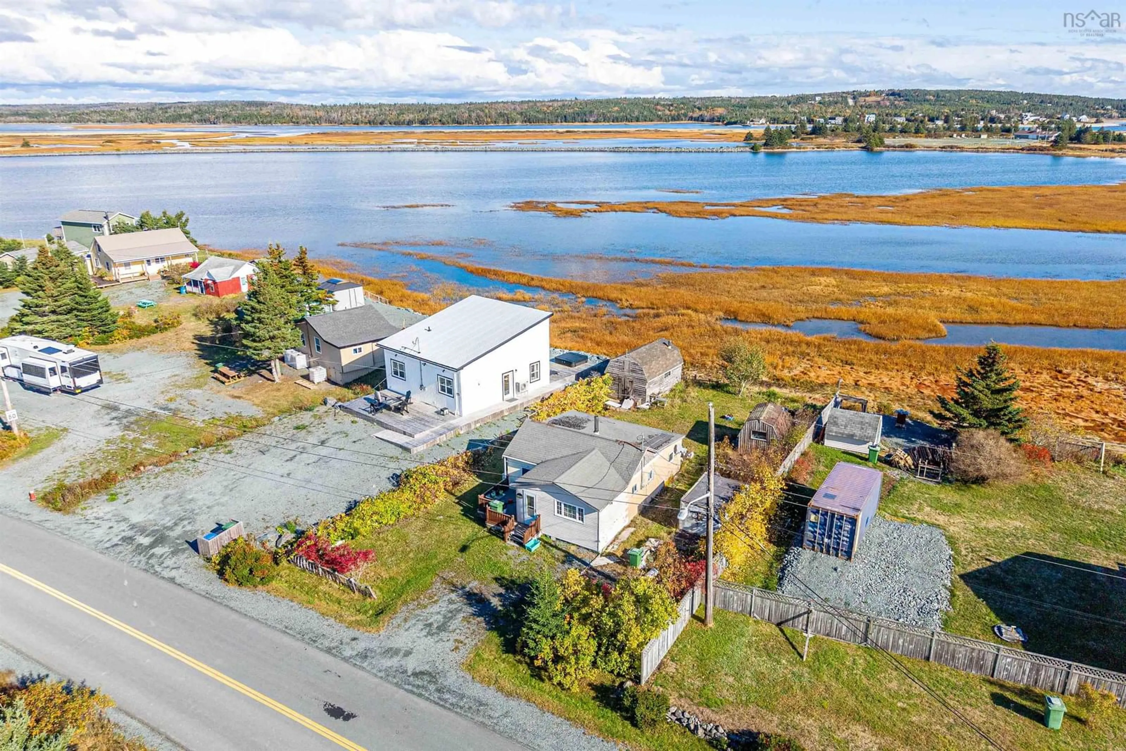 A pic from outside/outdoor area/front of a property/back of a property/a pic from drone, water/lake/river/ocean view for 2327 Cow Bay Rd, Cow Bay Nova Scotia B3G 1K8