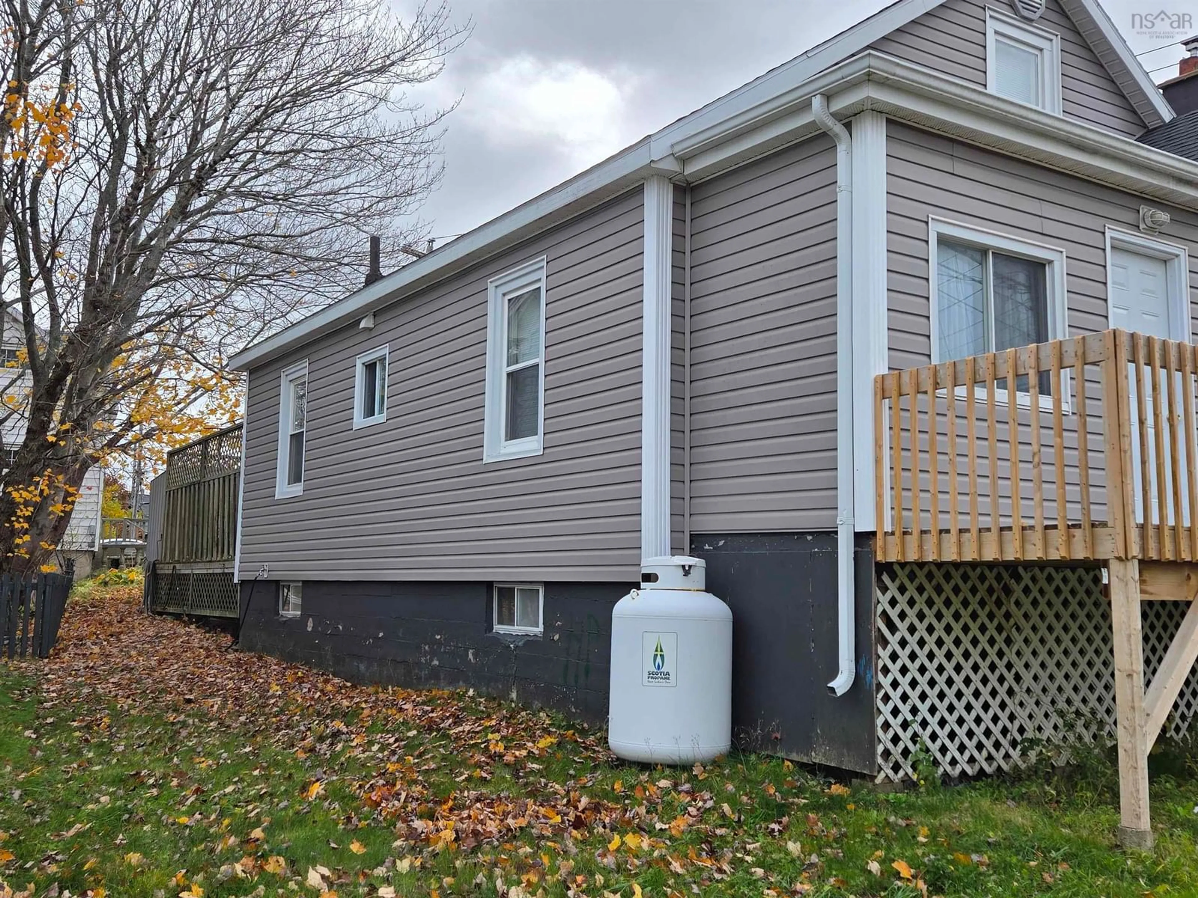 Home with vinyl exterior material, street for 2 Macaulays Lane, Sydney Nova Scotia B1P 3Z7