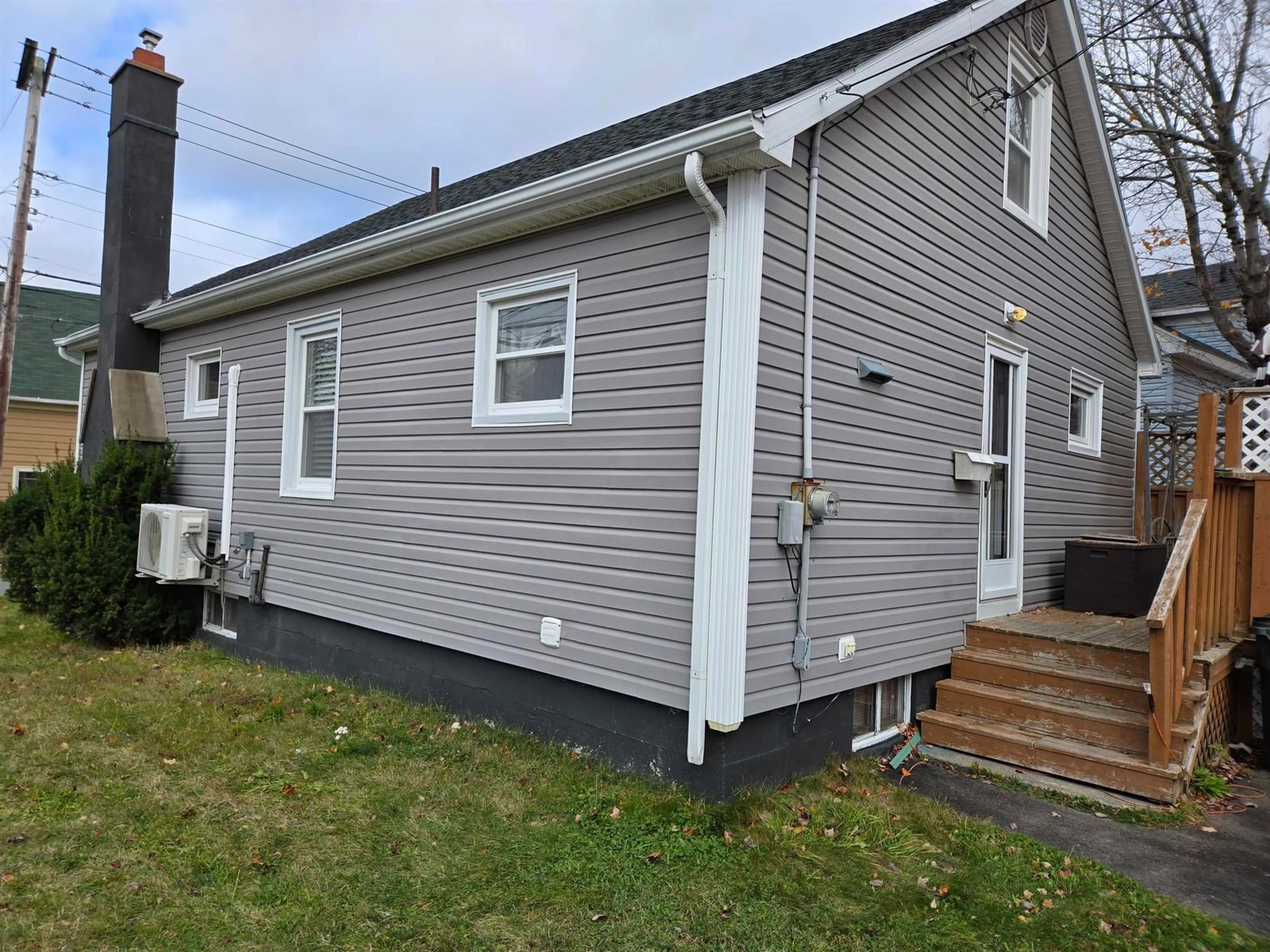 Home with vinyl exterior material, street for 2 Macaulays Lane, Sydney Nova Scotia B1P 3Z7