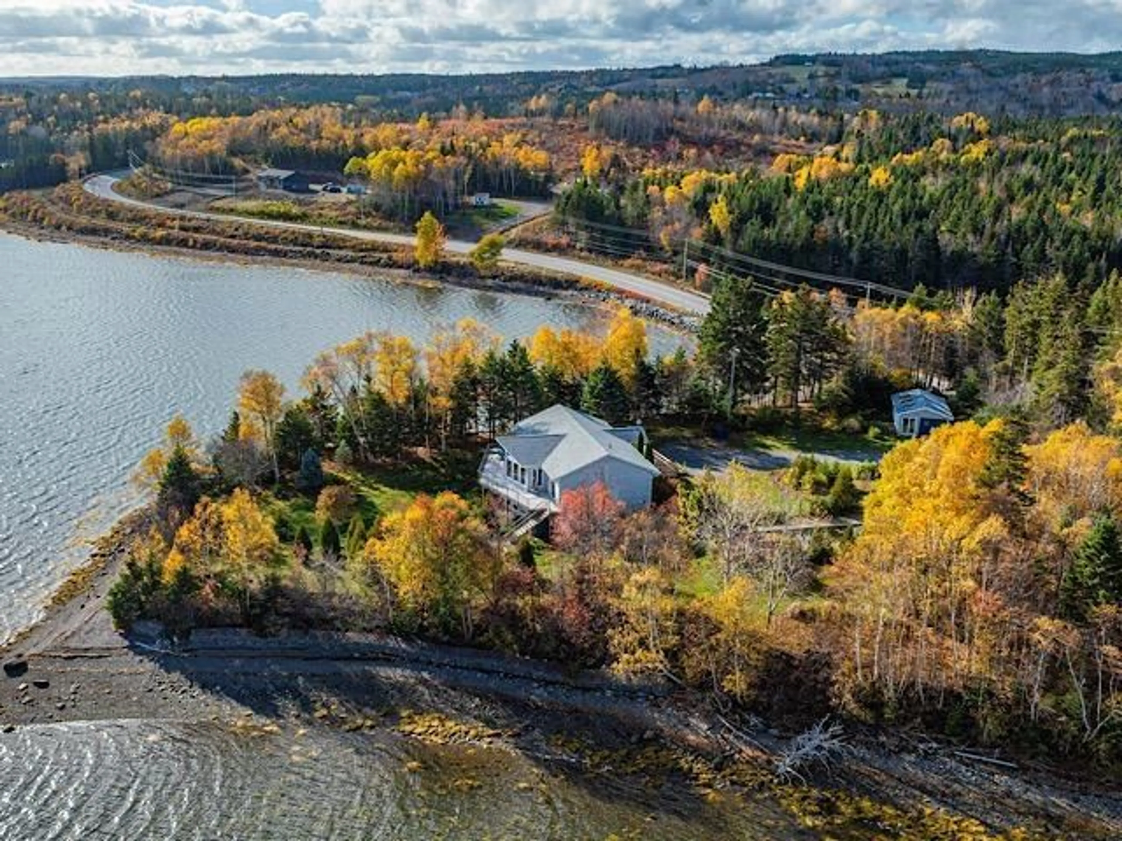 A pic from outside/outdoor area/front of a property/back of a property/a pic from drone, water/lake/river/ocean view for 10818 Hwy.16 Riverside, Guysborough Nova Scotia B0H 1N0