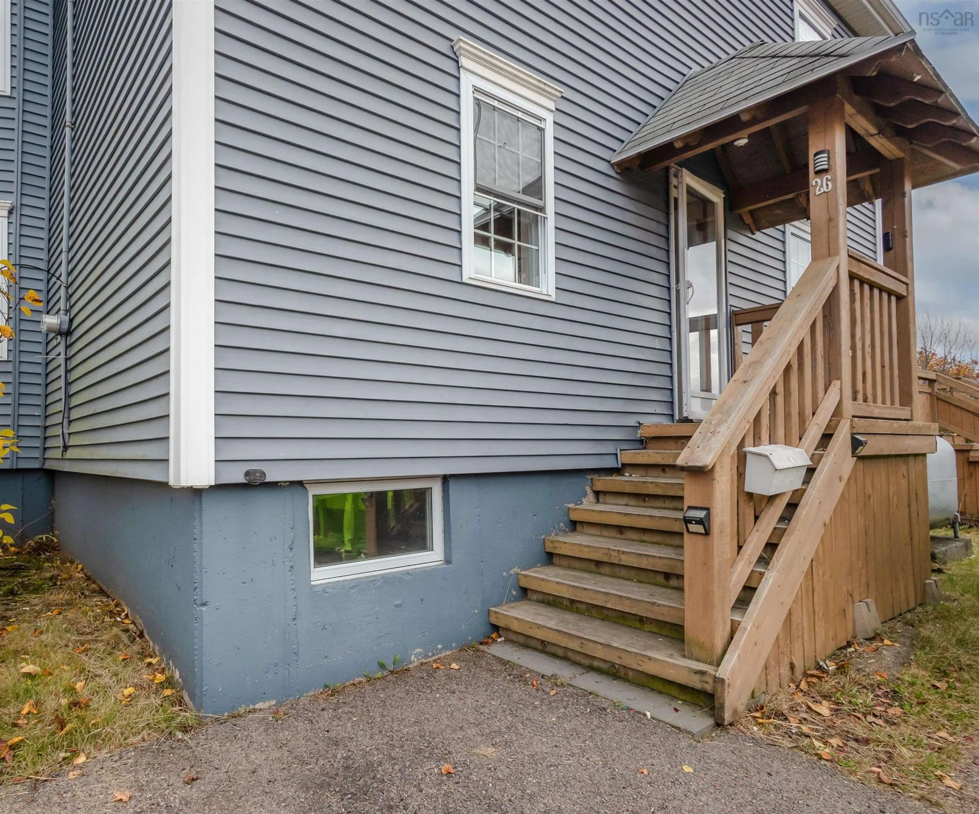 Home with vinyl exterior material, street for 26 Henry, Sydney Nova Scotia B1N 2G8