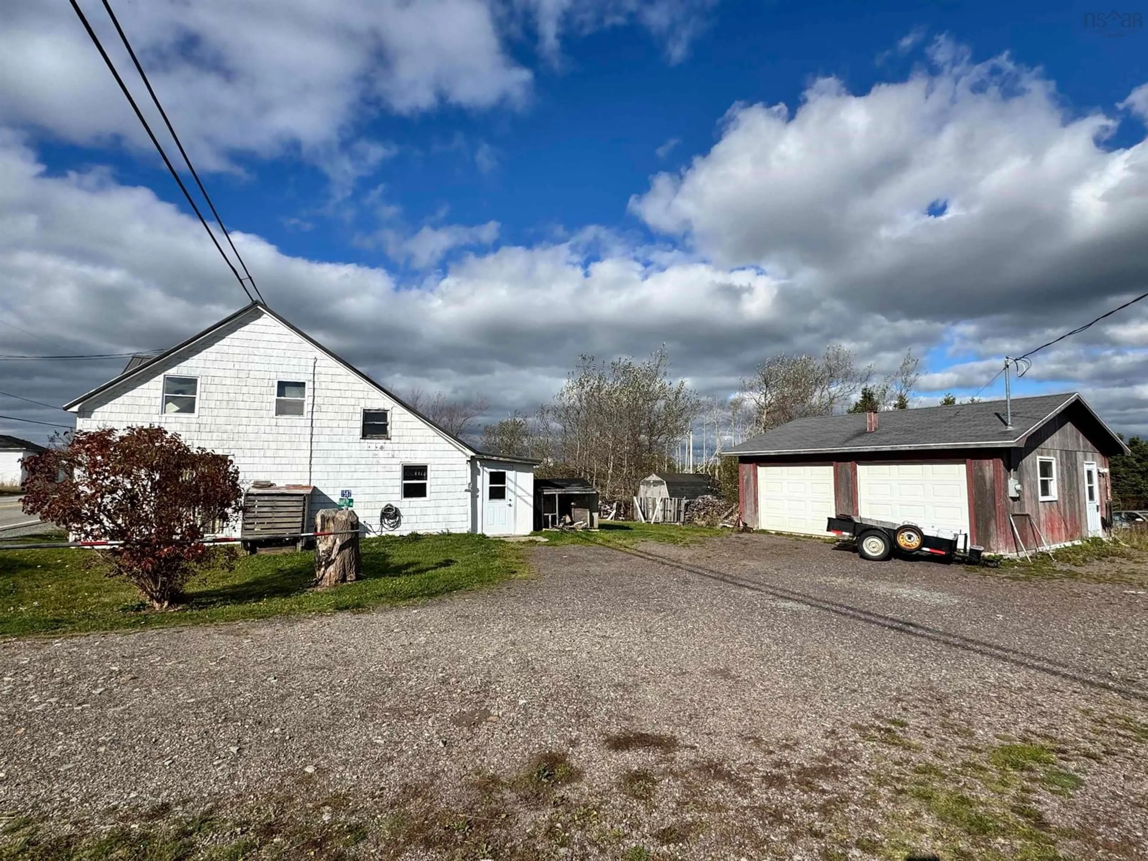 A pic from outside/outdoor area/front of a property/back of a property/a pic from drone, street for 1587 Highway 206, West Arichat Nova Scotia B0E 3J0