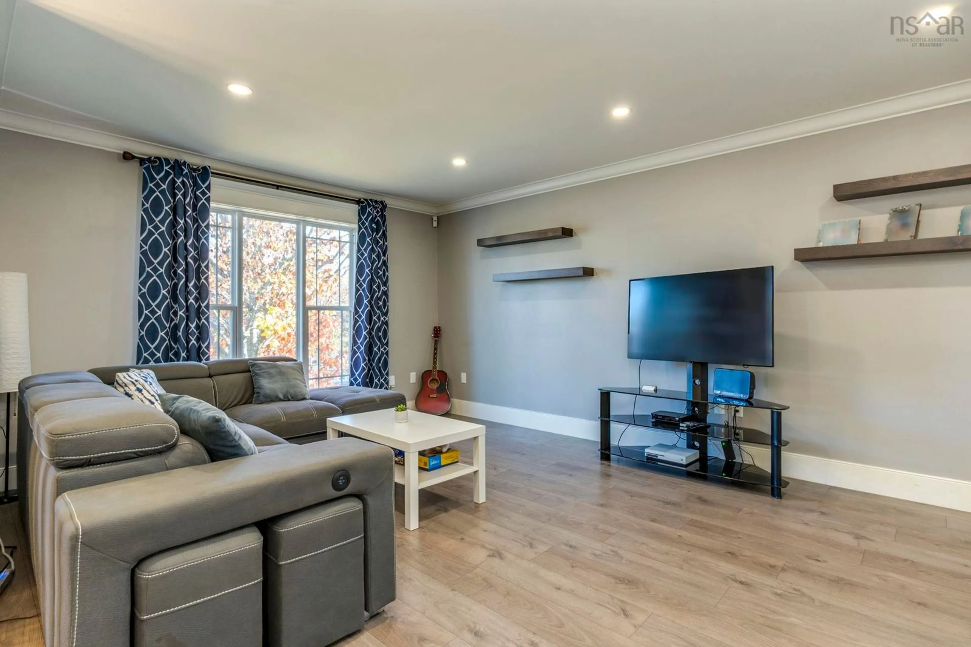 Living room with furniture, wood/laminate floor for 58 Highrigger Cres, Middle Sackville Nova Scotia B4E 2Z7