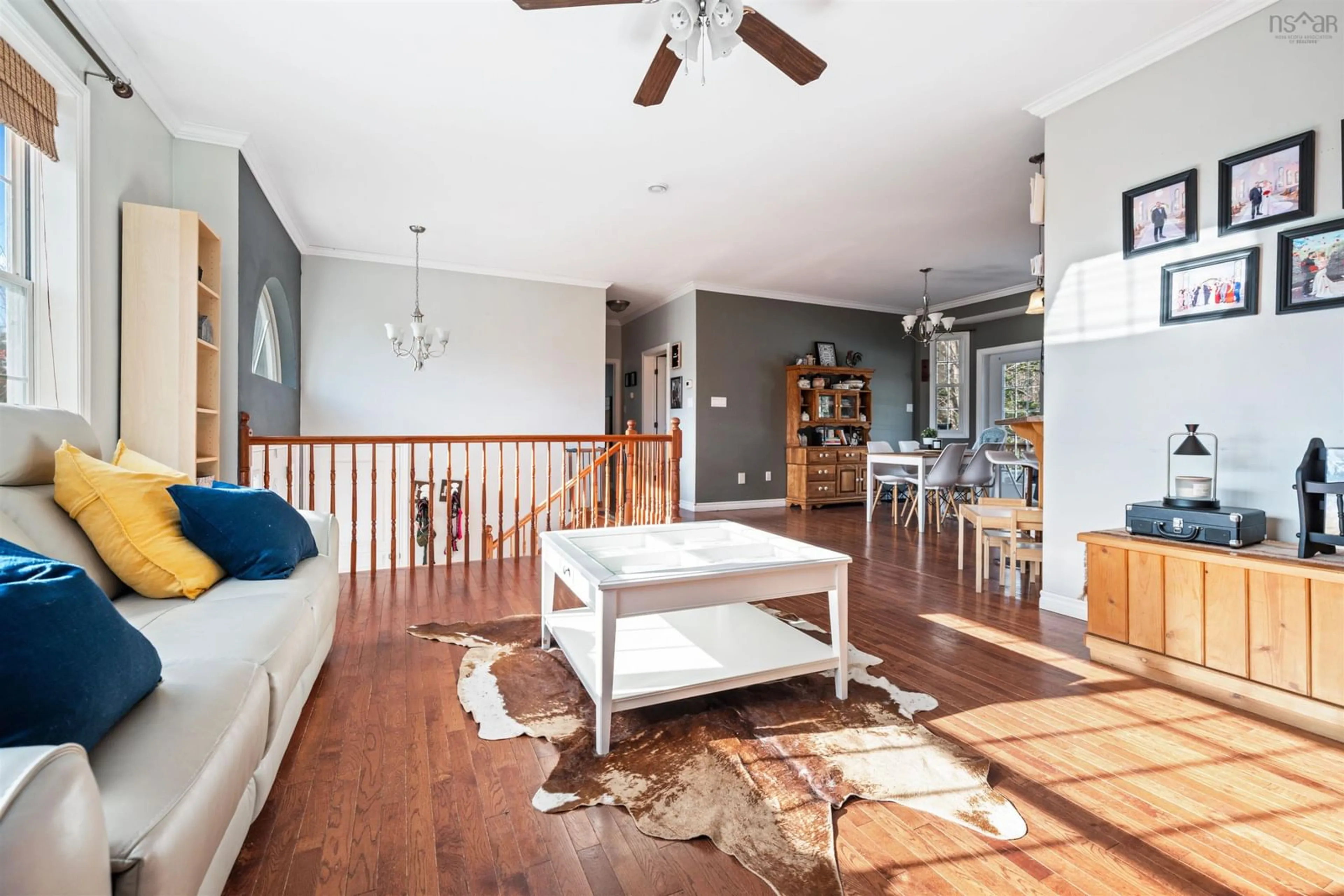 Living room with furniture, wood/laminate floor for 3 Maceachern Loop, Lower South River Nova Scotia B2G 2L4