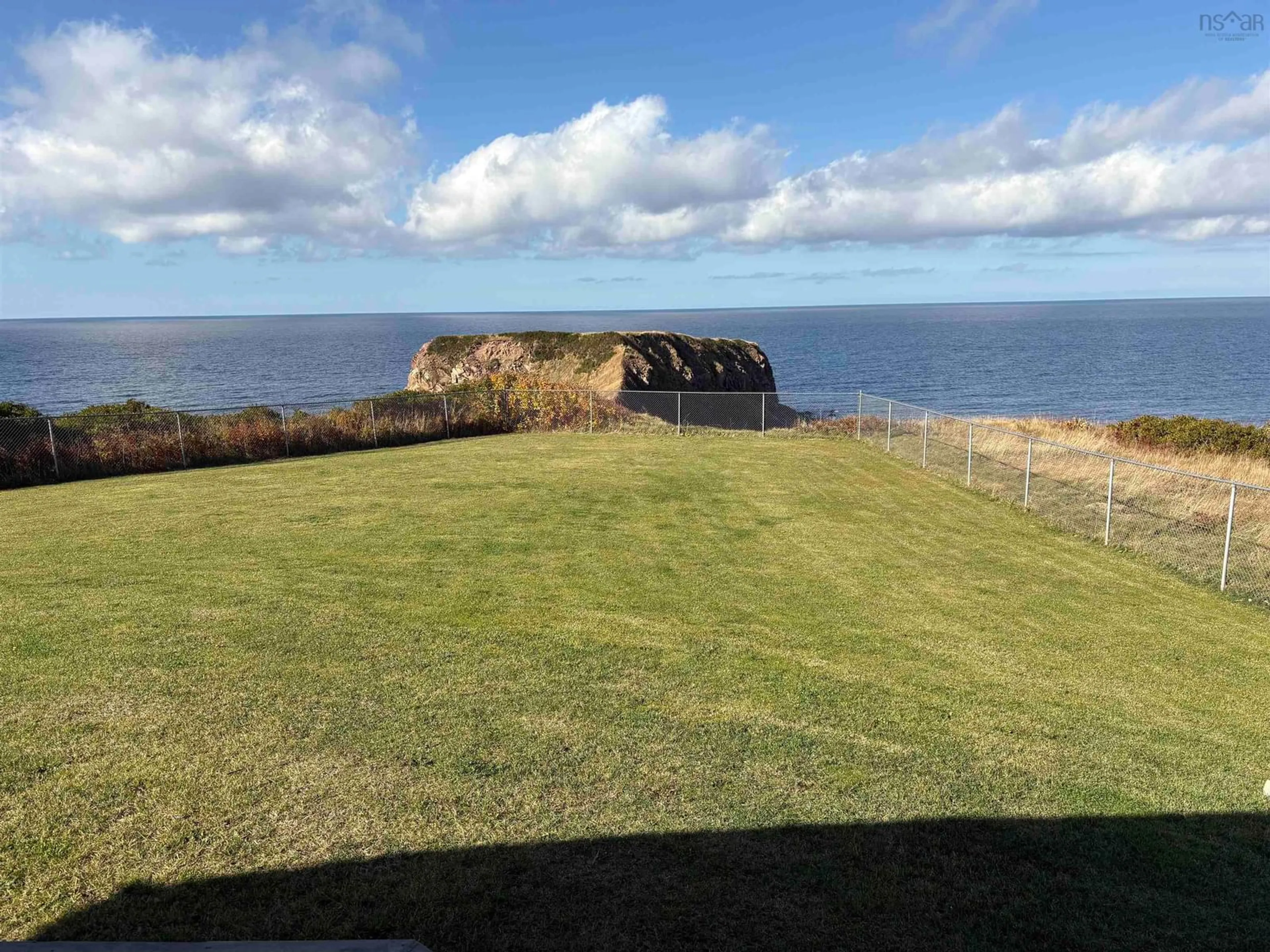 A pic from outside/outdoor area/front of a property/back of a property/a pic from drone, water/lake/river/ocean view for 92 Chemin Simeon Aucoin Rd, St. Joseph du Moine Nova Scotia B0E 3A0