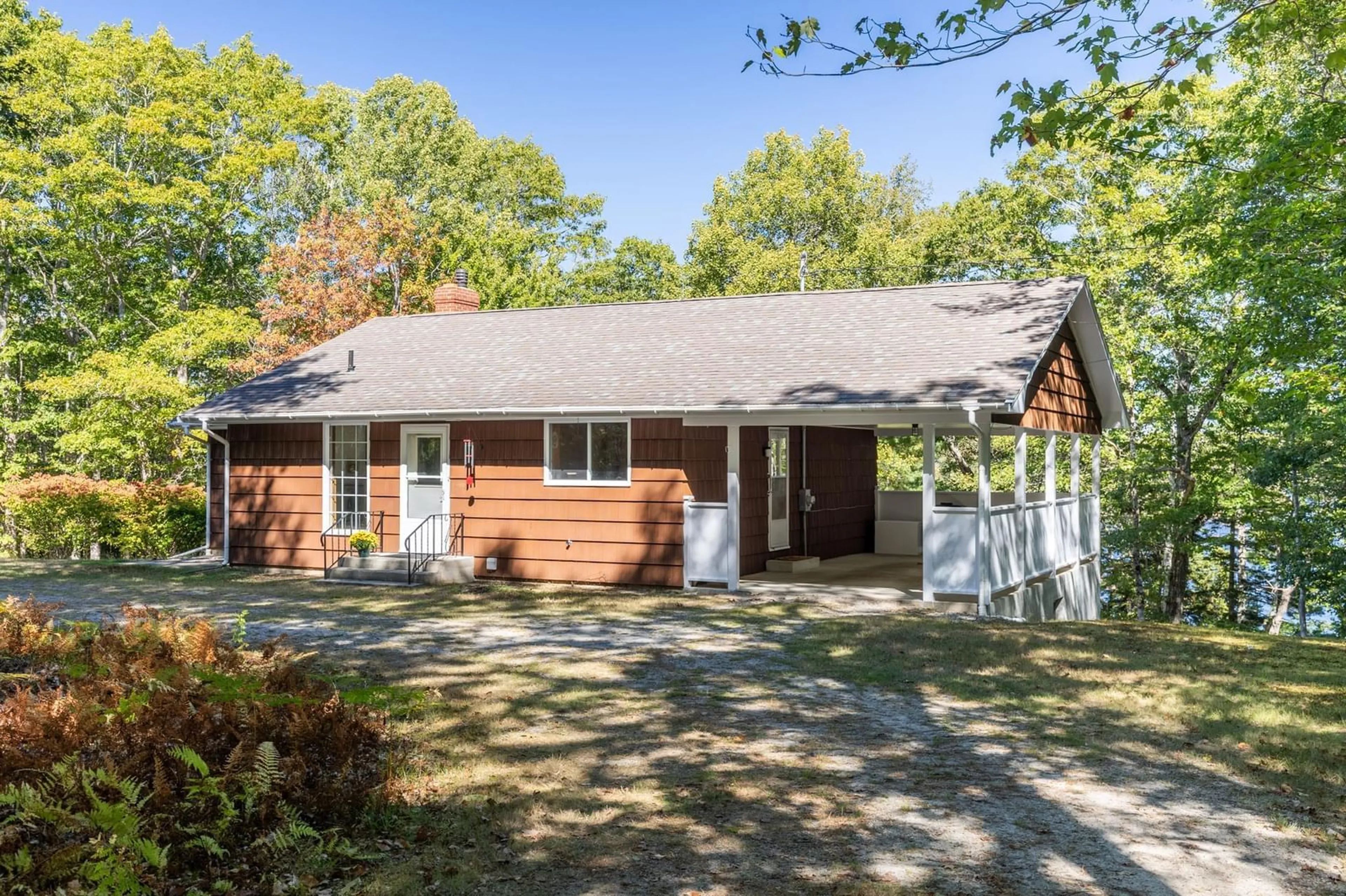 Home with vinyl exterior material, street for 587 Highway 203, Carleton Nova Scotia B5A 5R3