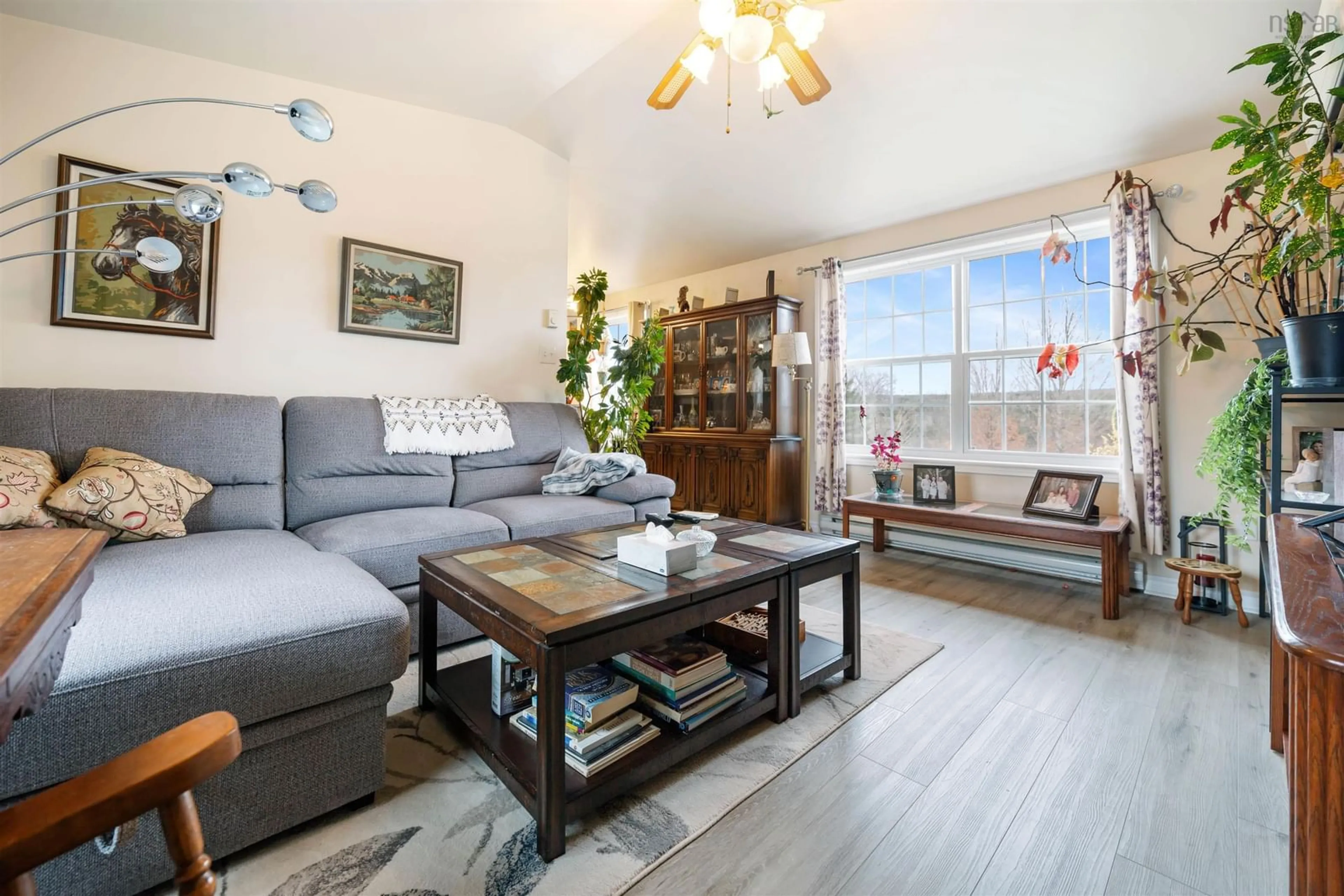 Living room with furniture, wood/laminate floor for 2943 Nova Scotia 311, Upper North River Nova Scotia B6L 6J8
