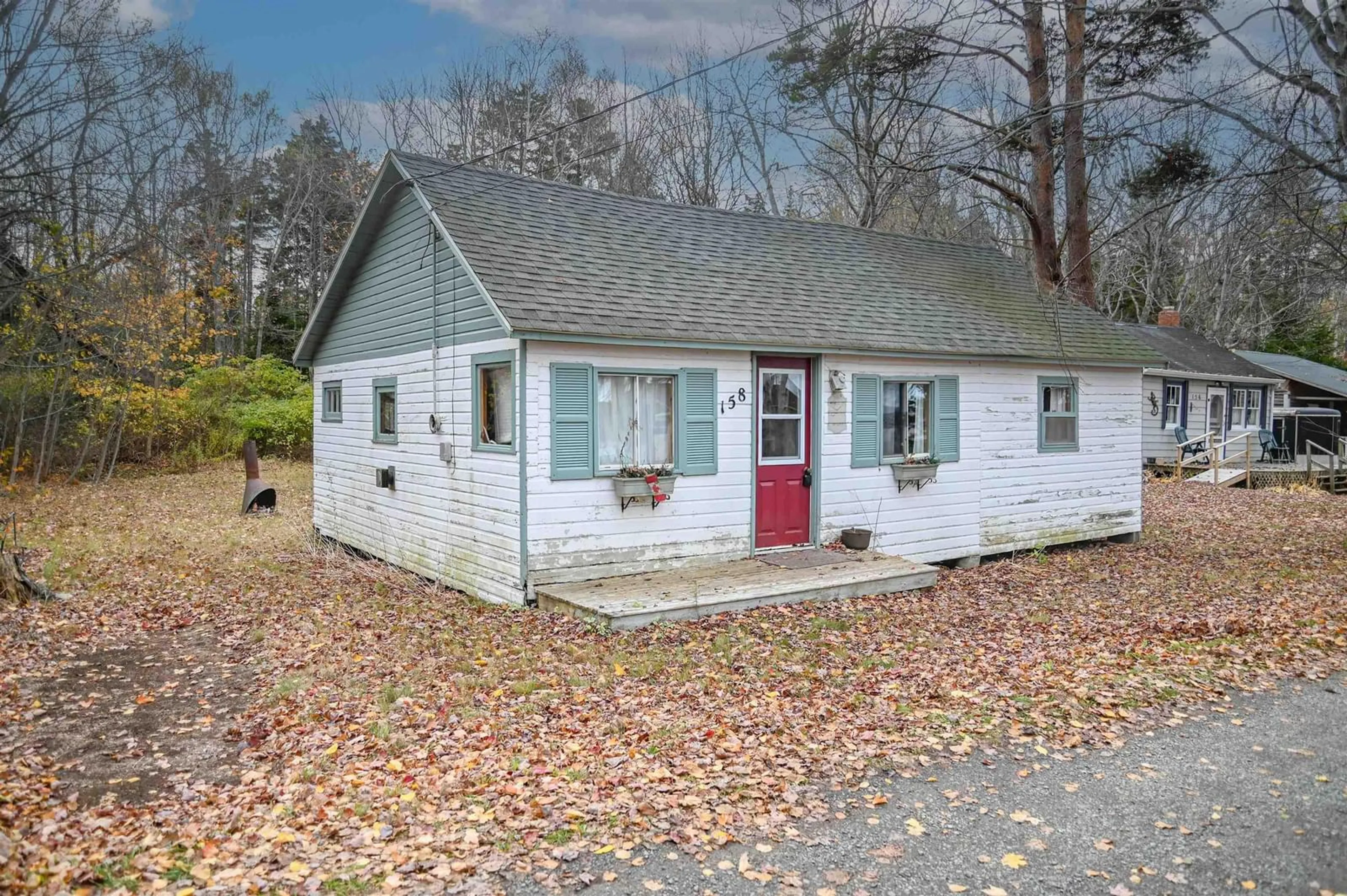 Home with vinyl exterior material, street for 158 Plover Lane, North Grand Pre Nova Scotia B0P 1M0