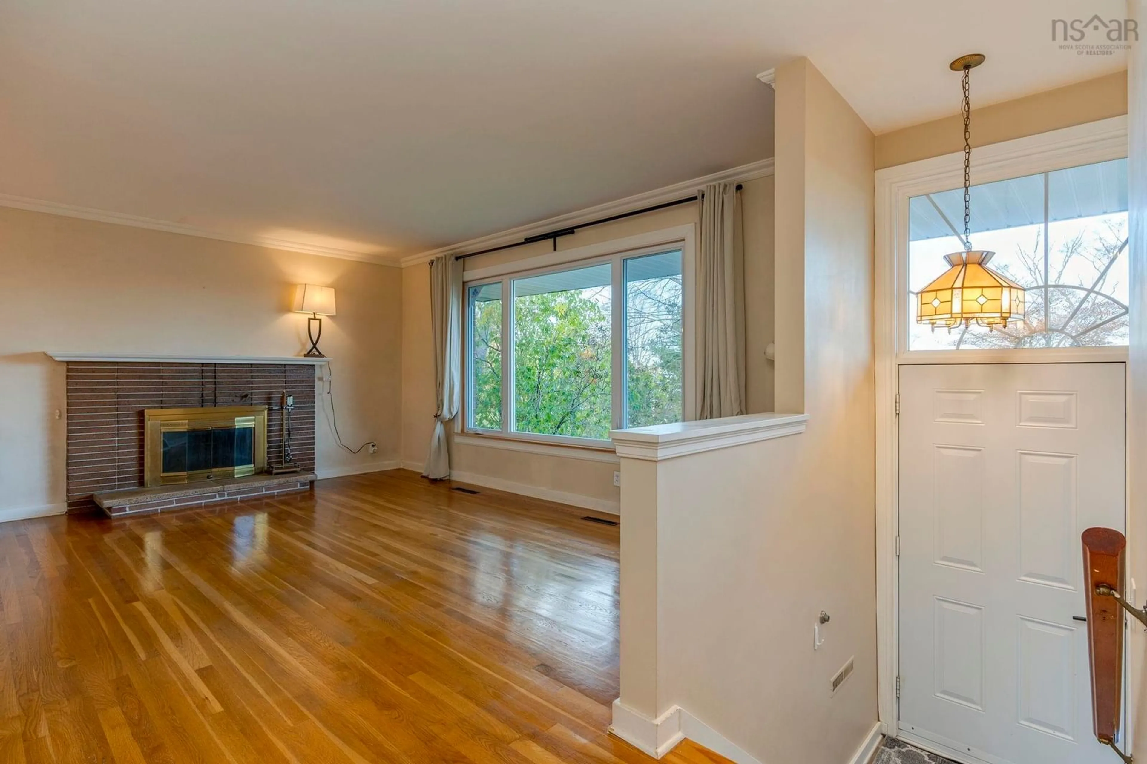 Living room with furniture, wood/laminate floor for 34 Hazelholme Dr, Halifax Nova Scotia B3M 1N5