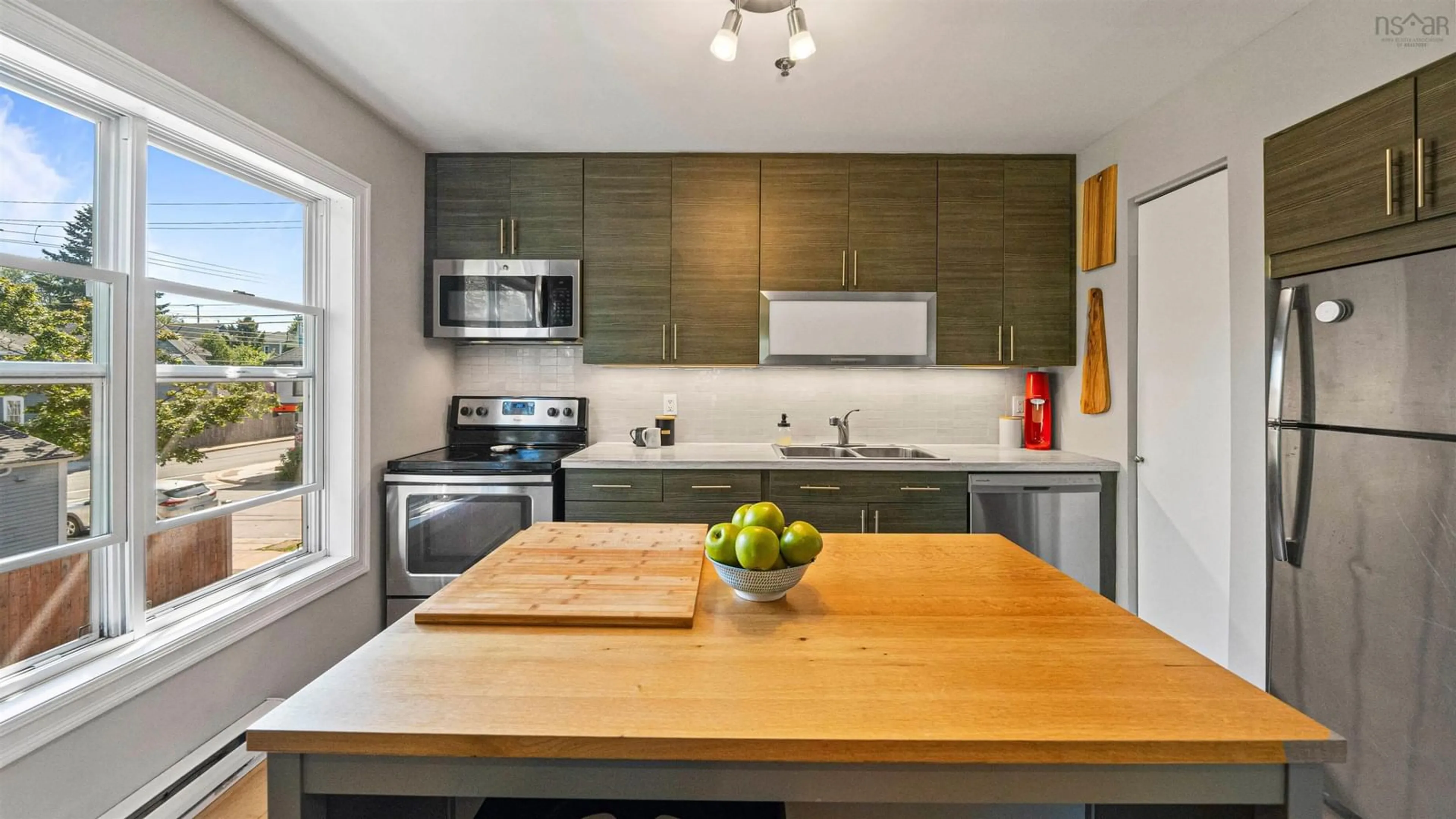 Open concept kitchen, wood/laminate floor for 2093 Creighton St #4, Halifax Nova Scotia B3K 3R5