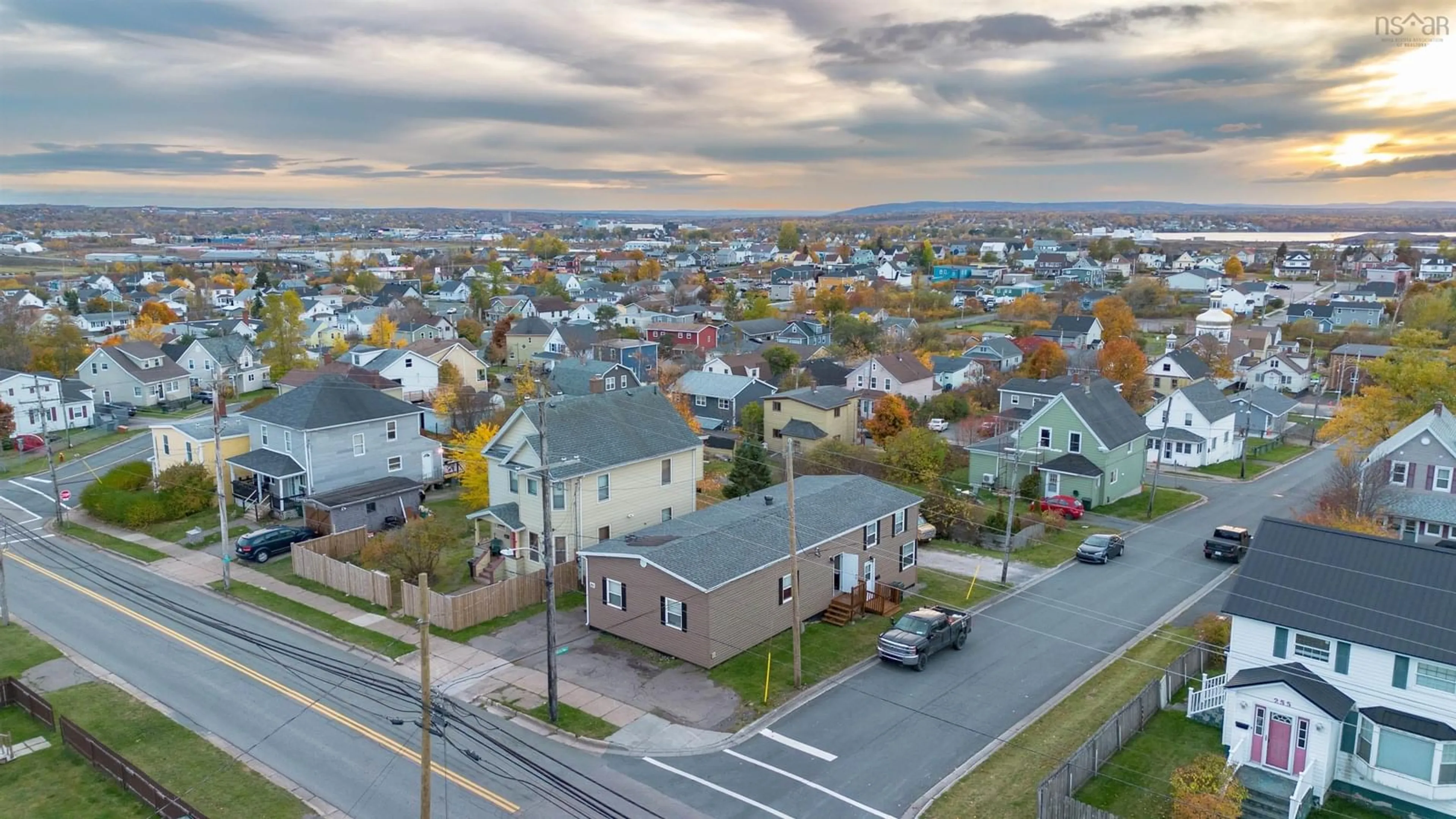 A pic from outside/outdoor area/front of a property/back of a property/a pic from drone, street for 253 Lingan Rd, Sydney Nova Scotia B1N 1V9