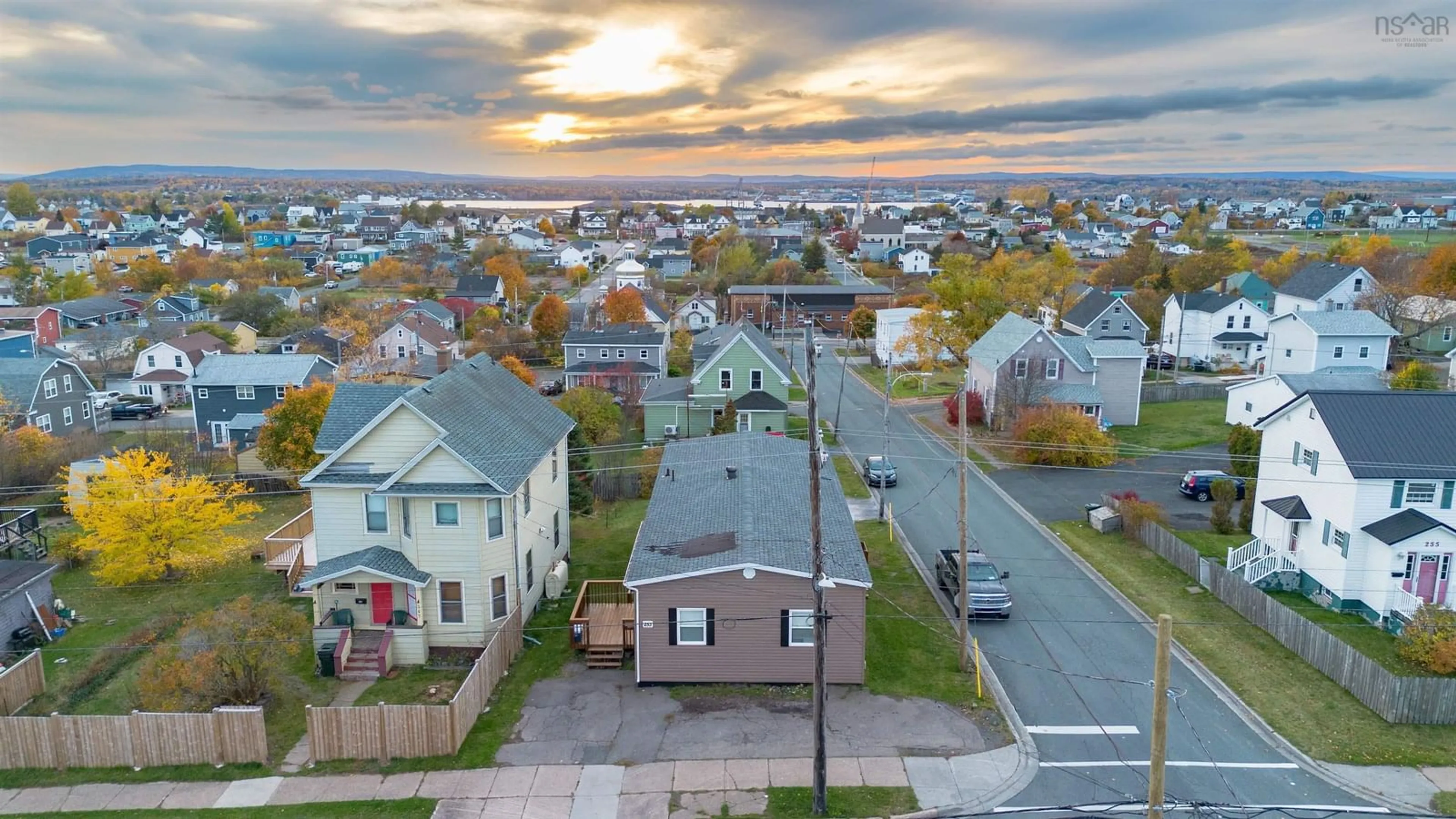 A pic from outside/outdoor area/front of a property/back of a property/a pic from drone, street for 253 Lingan Rd, Sydney Nova Scotia B1N 1V9