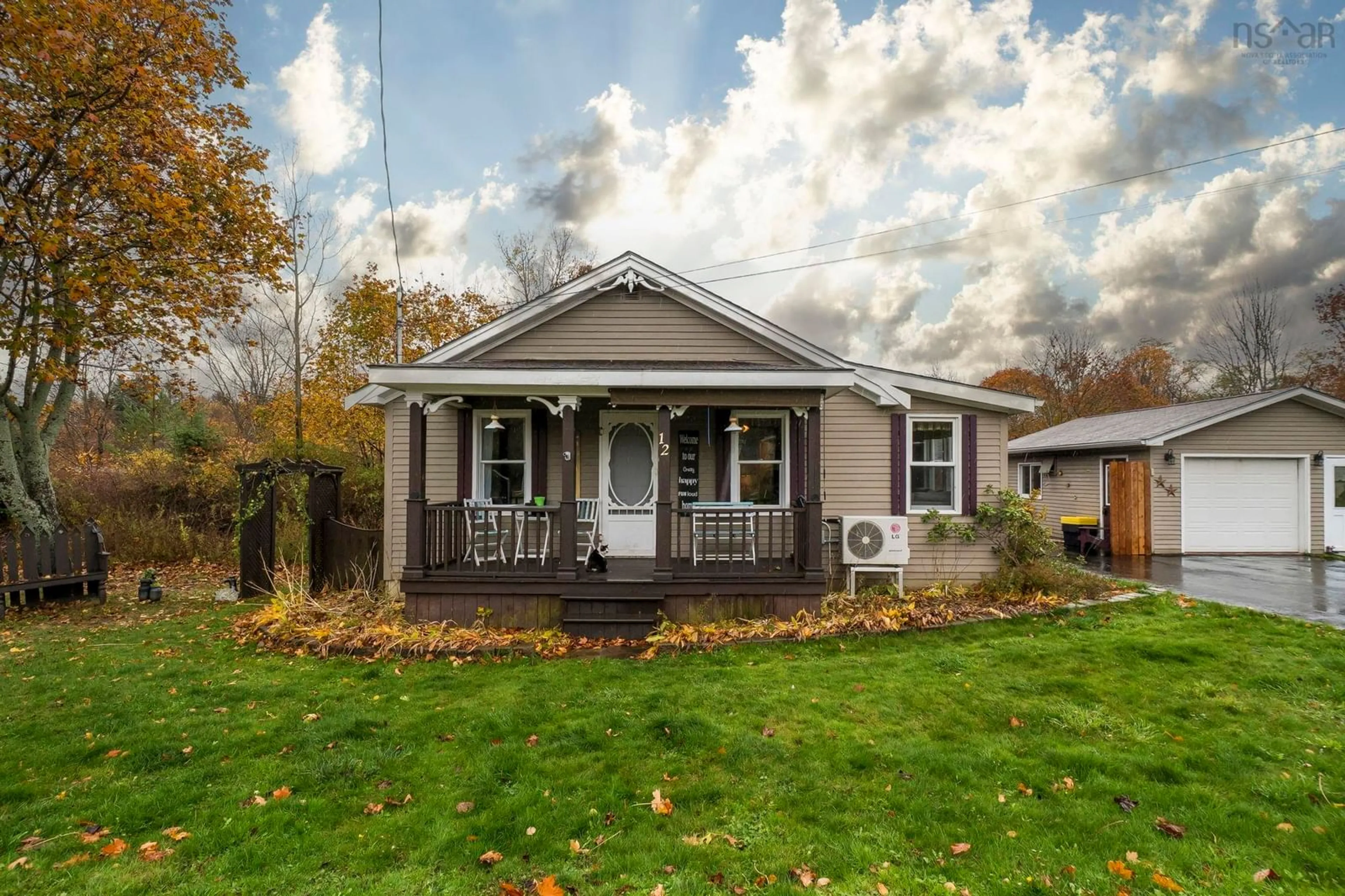 Home with vinyl exterior material, street for 12 Tannery Rd, Hantsport Nova Scotia B0P 1P0