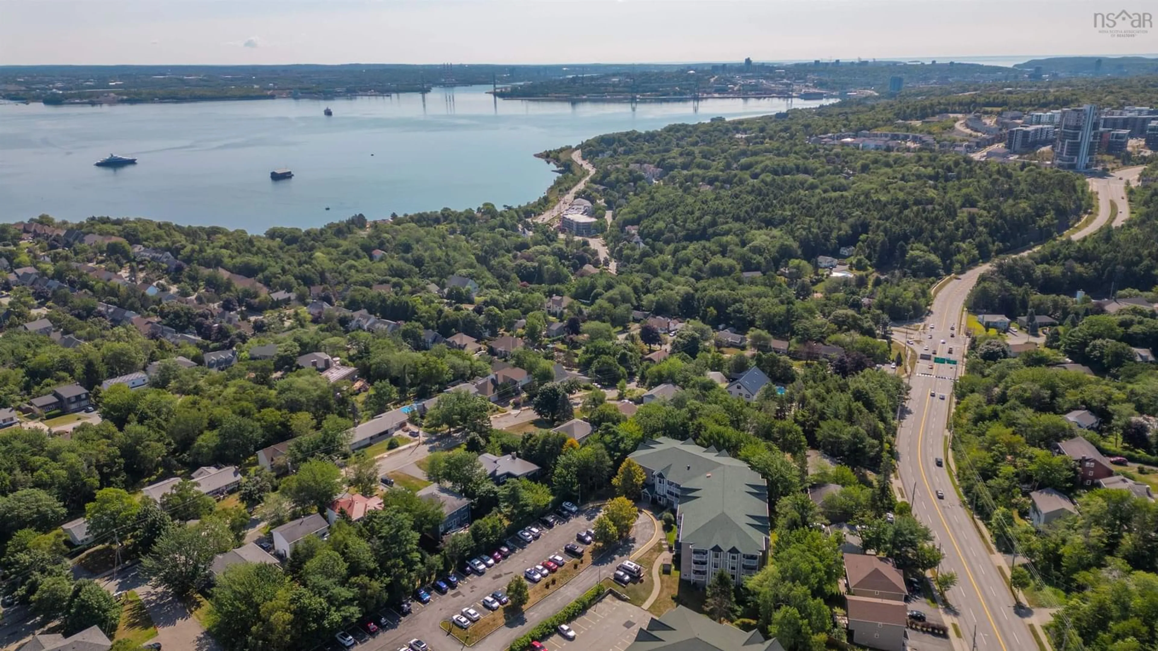 A pic from outside/outdoor area/front of a property/back of a property/a pic from drone, water/lake/river/ocean view for 87 Kearney Lake Rd #409, Halifax Nova Scotia B3M 4H1