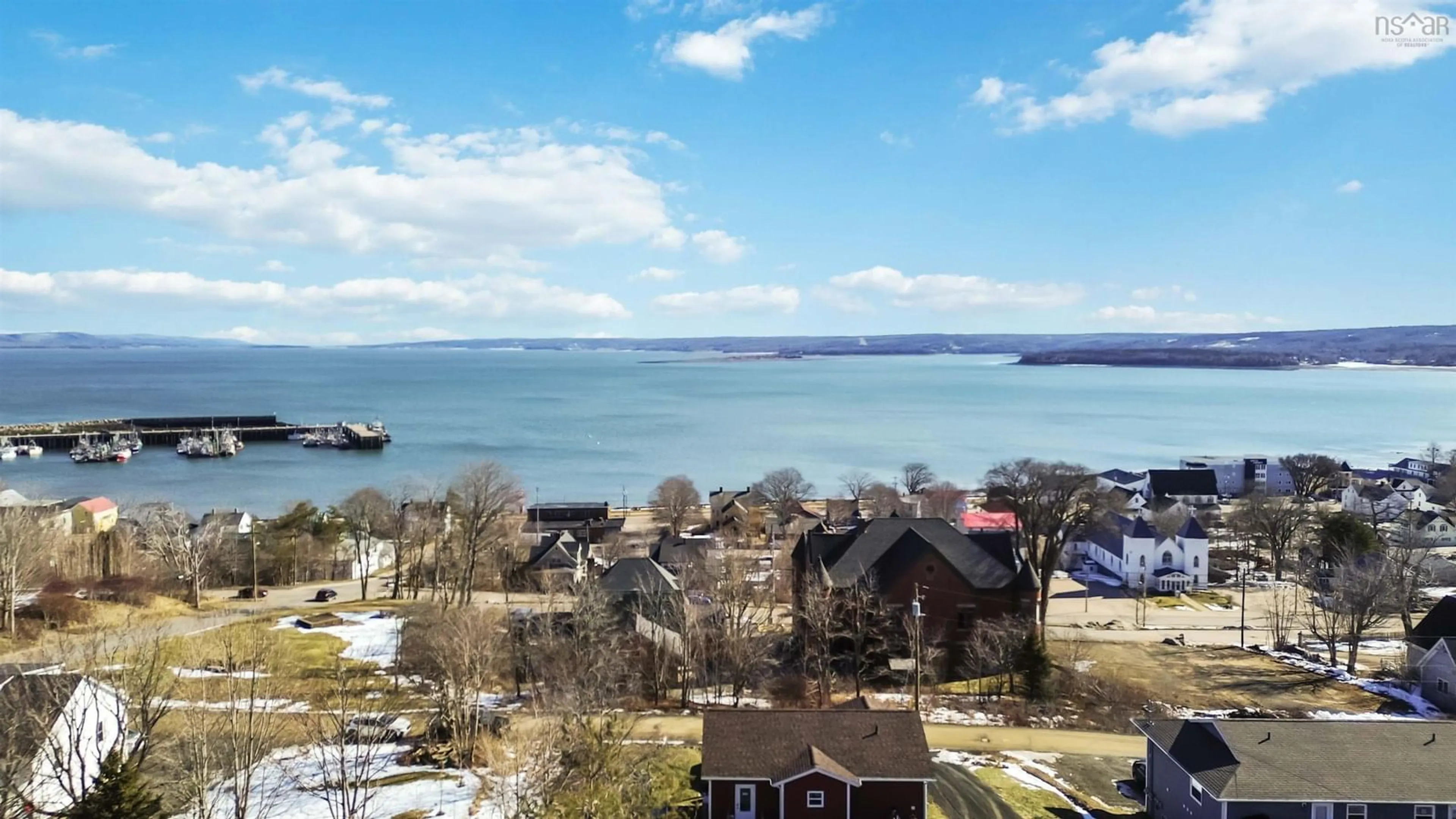 A pic from outside/outdoor area/front of a property/back of a property/a pic from drone, water/lake/river/ocean view for 109 Second Ave Ave, Digby Nova Scotia B0V 1A0