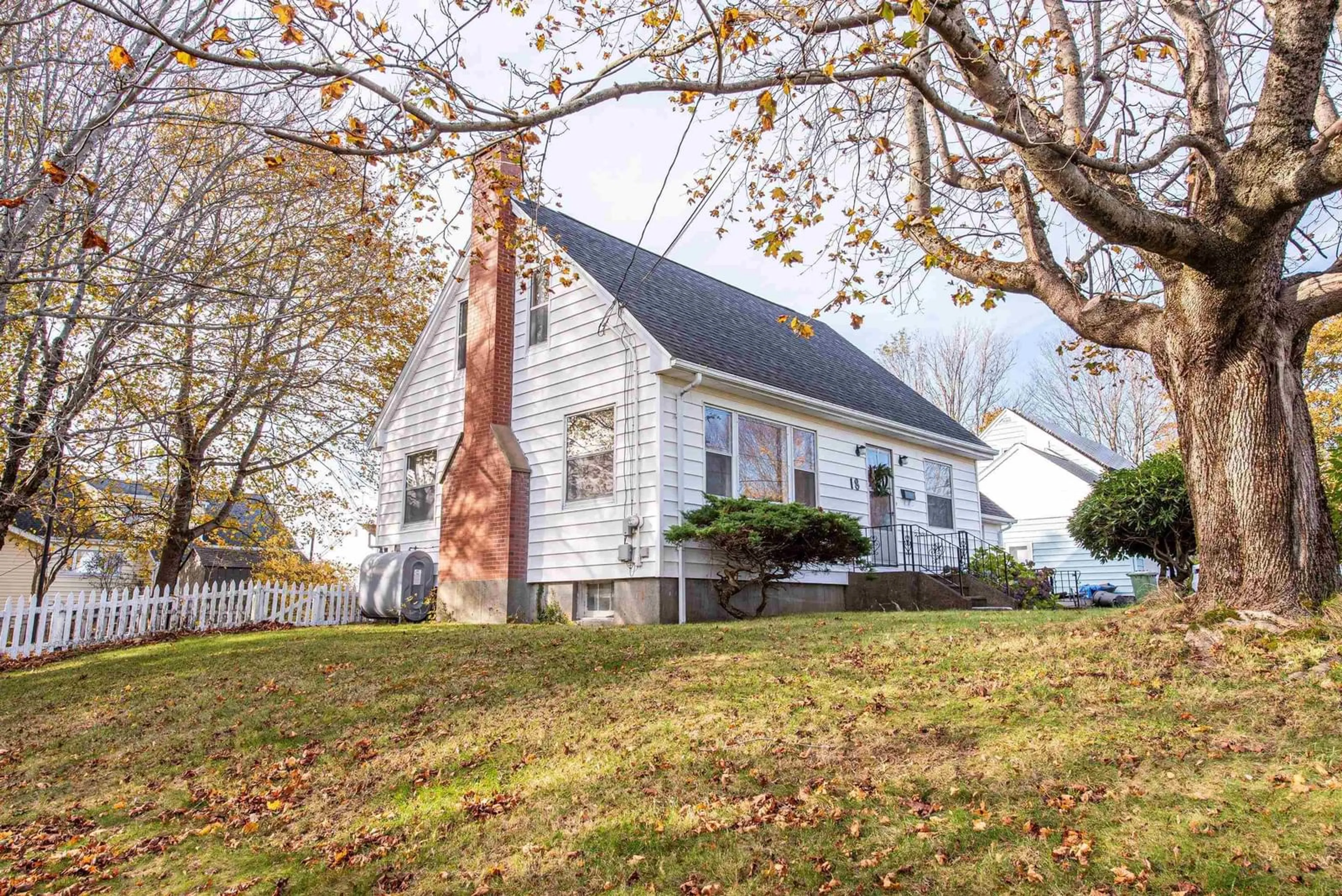 Home with vinyl exterior material, street for 18 Margaree Pky, Dartmouth Nova Scotia B2W 1P9