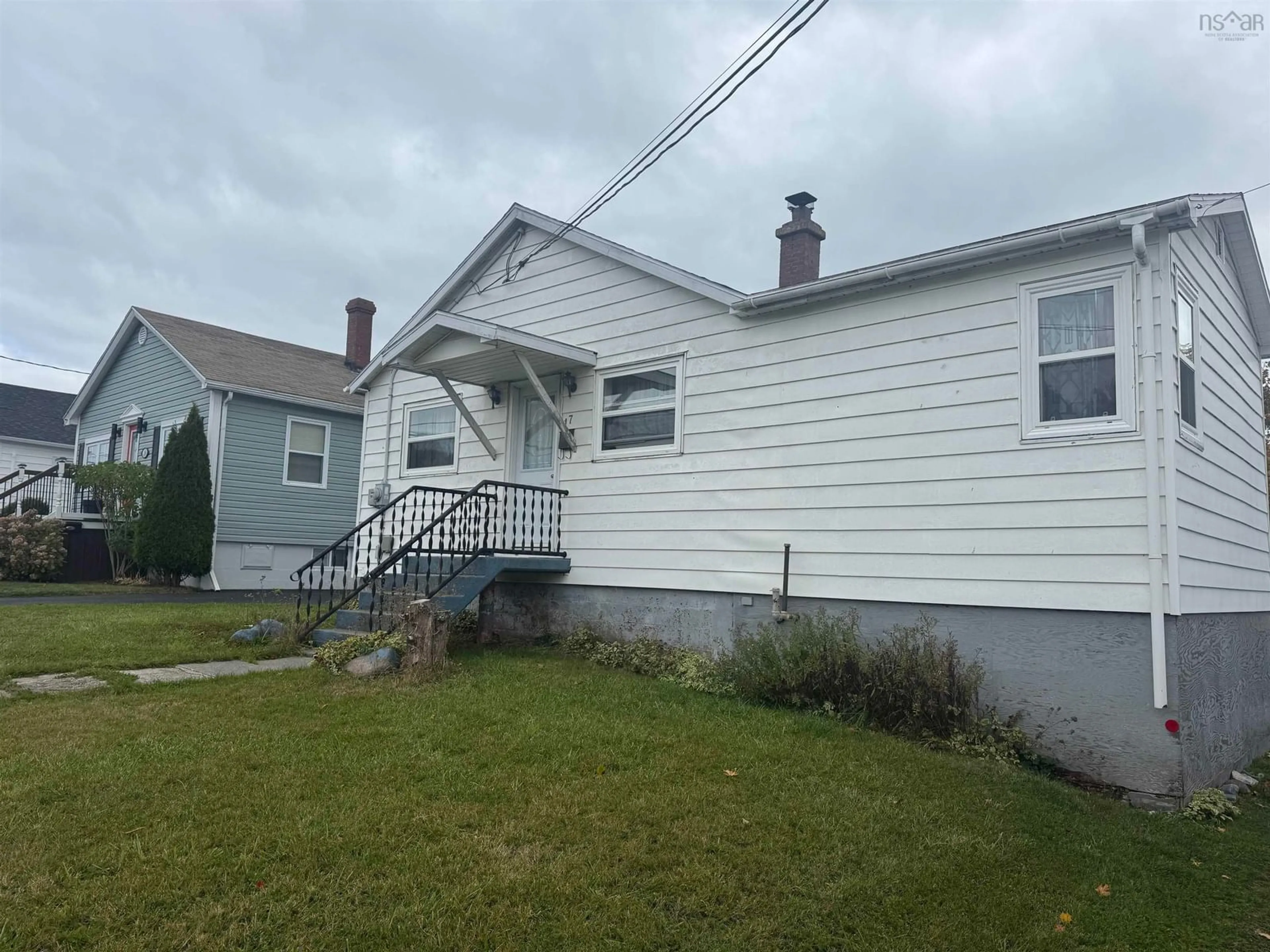 Home with vinyl exterior material, street for 17 Young Ave, North Sydney Nova Scotia B2A 1Y7
