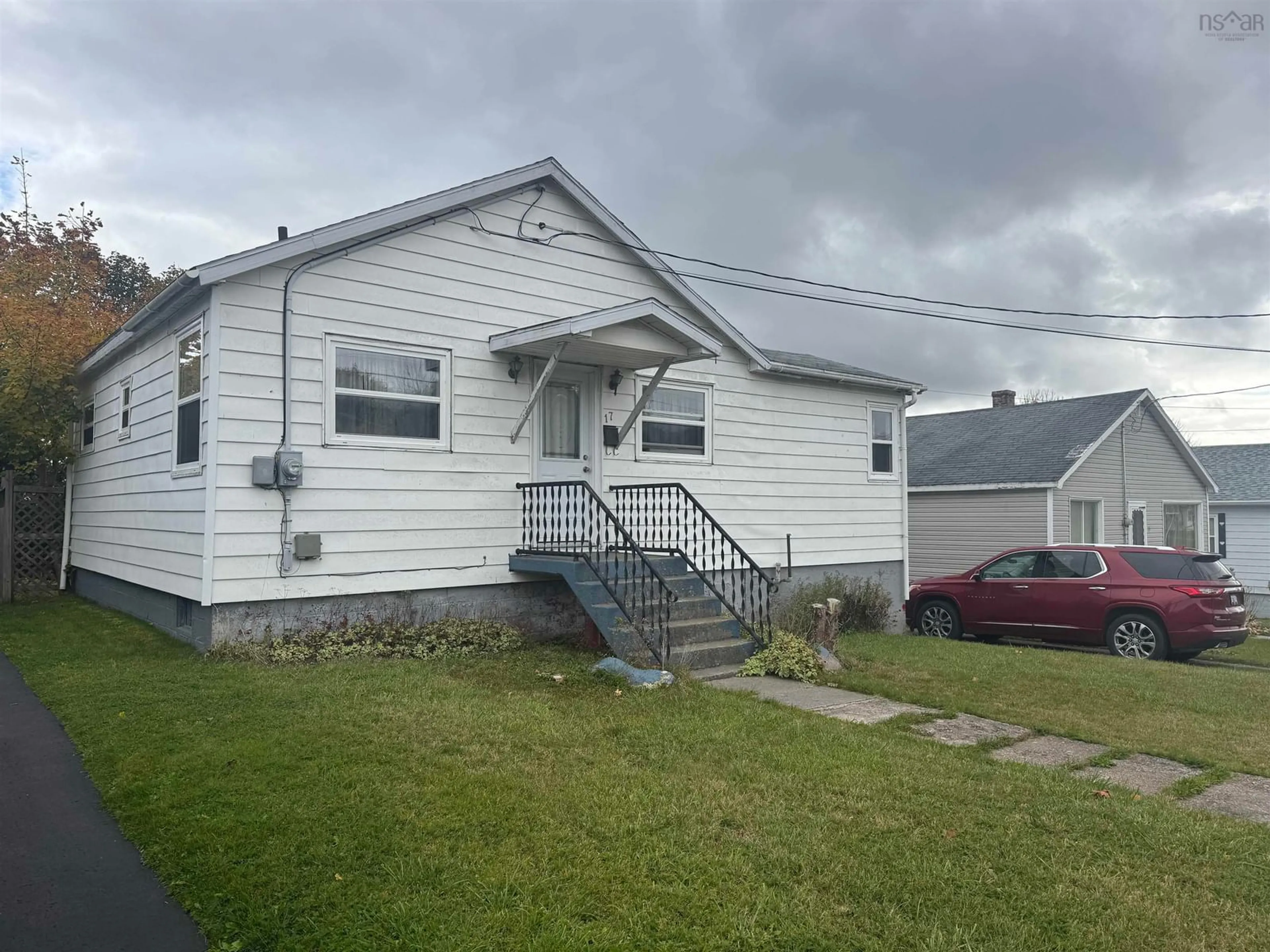 Home with vinyl exterior material, street for 17 Young Ave, North Sydney Nova Scotia B2A 1Y7