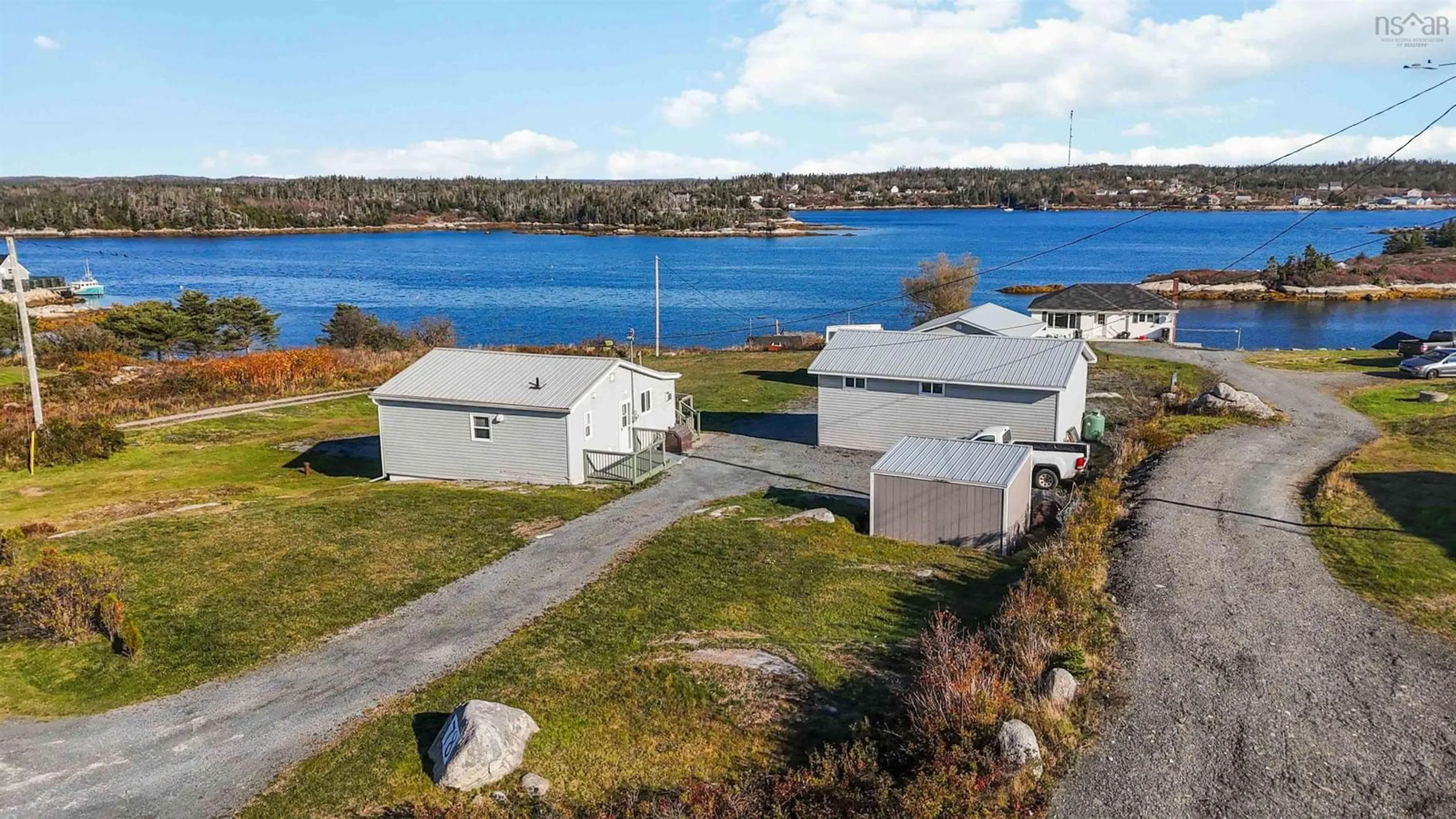 A pic from outside/outdoor area/front of a property/back of a property/a pic from drone, water/lake/river/ocean view for 78 West Dover Rd, West Dover Nova Scotia B3Z 3S7