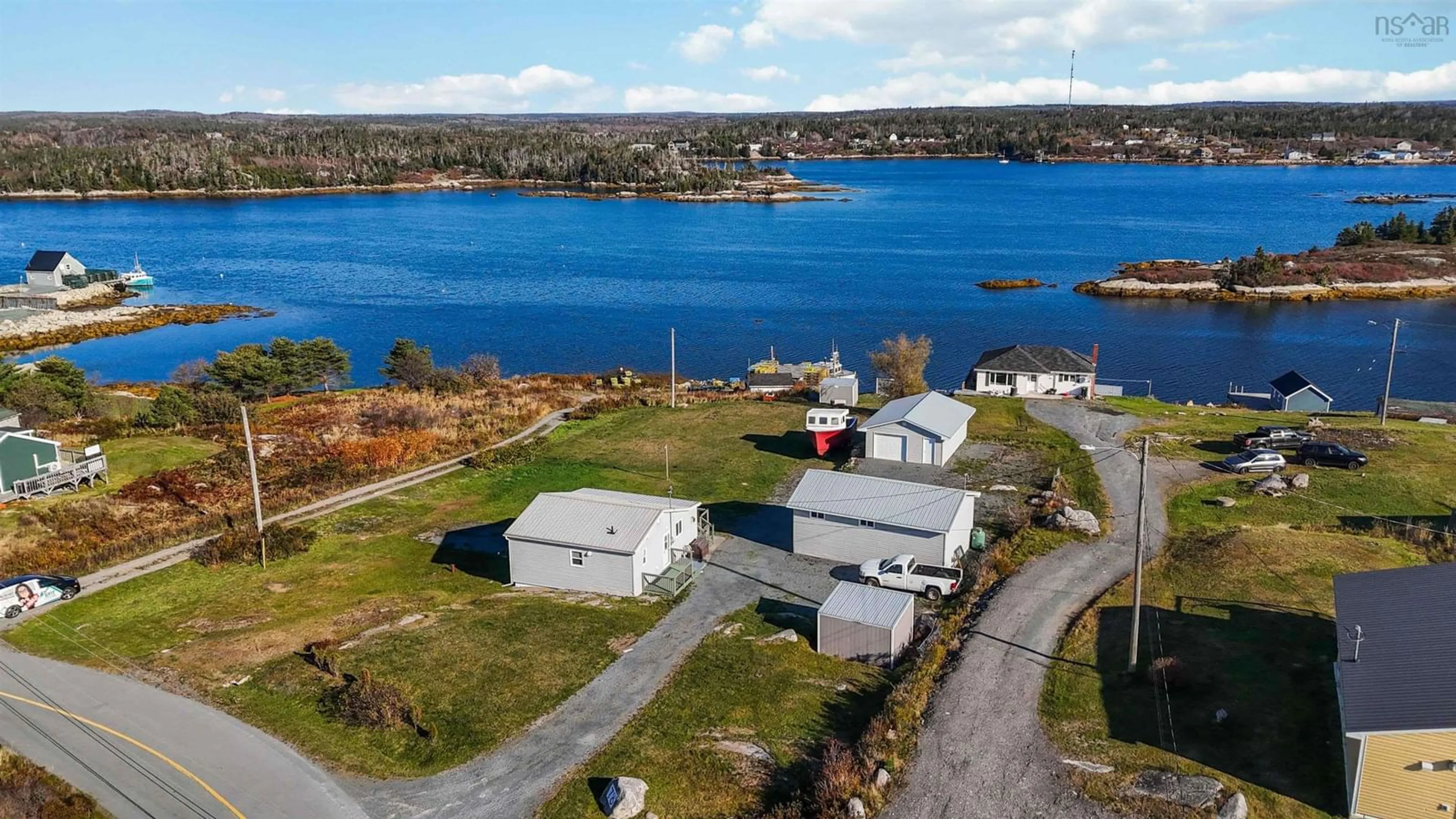 A pic from outside/outdoor area/front of a property/back of a property/a pic from drone, water/lake/river/ocean view for 78 West Dover Rd, West Dover Nova Scotia B3Z 3S7