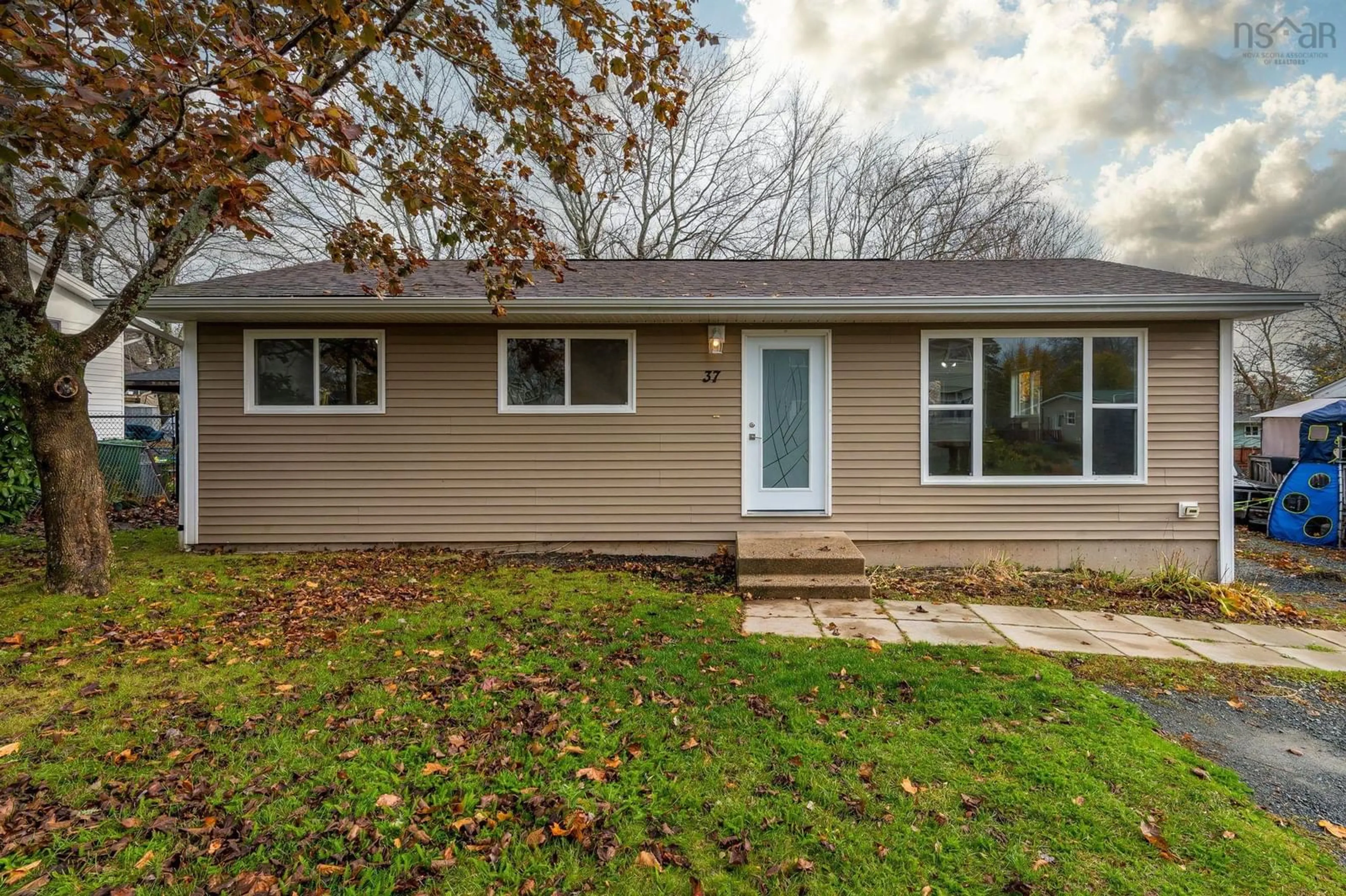 Home with vinyl exterior material, street for 37 Kipling Dr, Lower Sackville Nova Scotia B4C 2X8