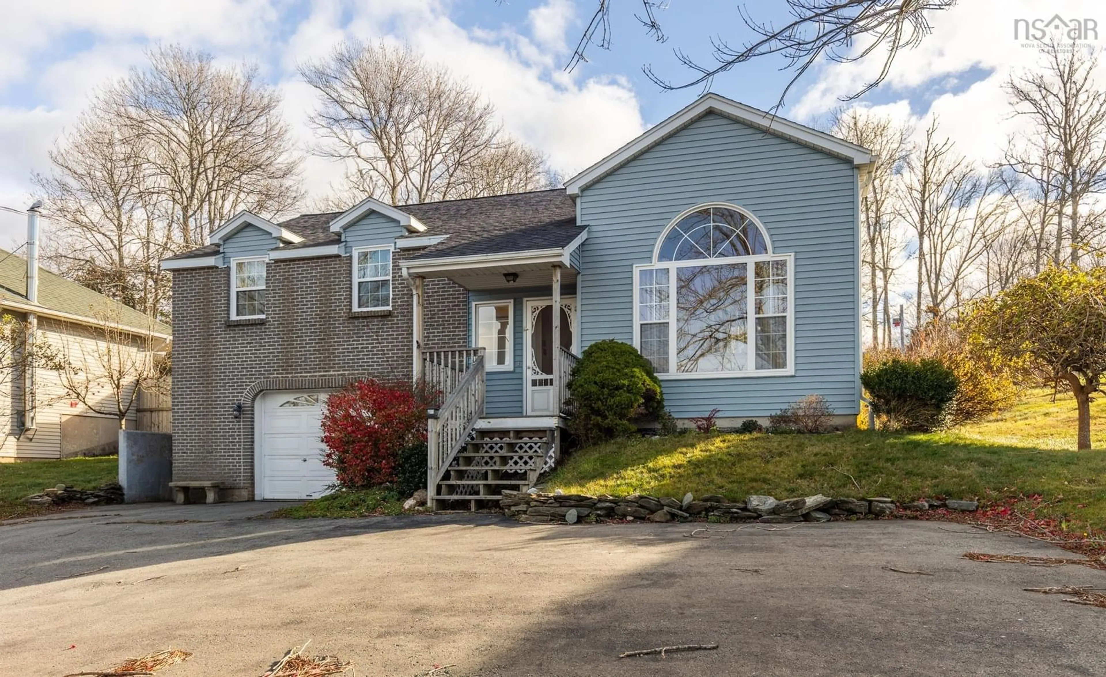 Home with vinyl exterior material, street for 132 Highway 1, Dayton Nova Scotia B5A 5A1