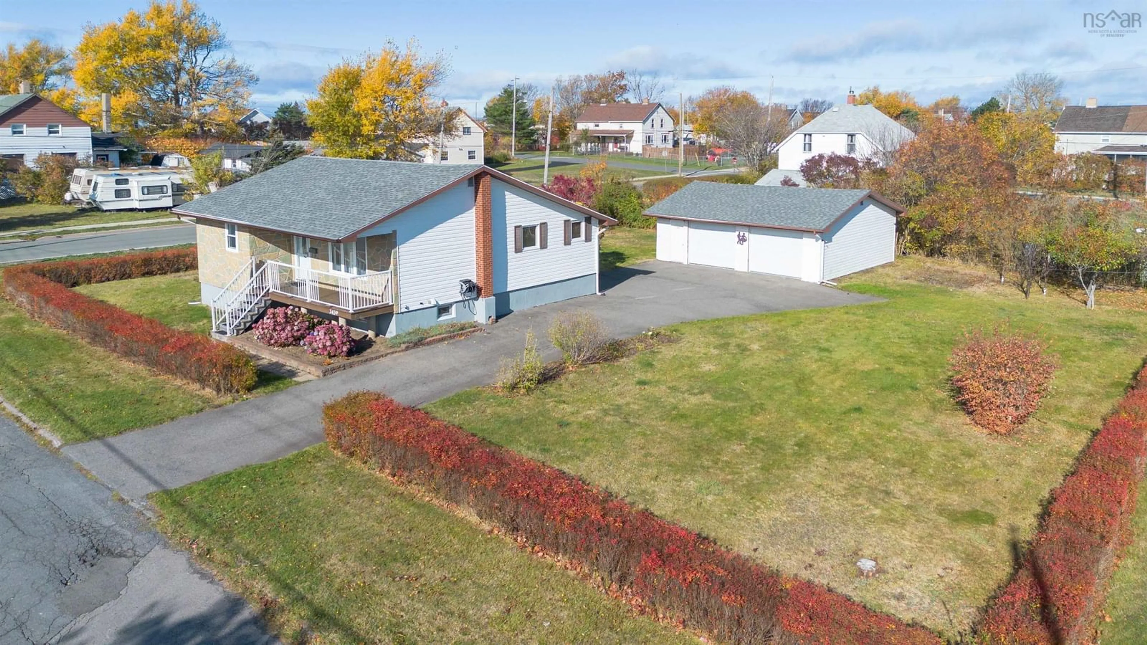 A pic from outside/outdoor area/front of a property/back of a property/a pic from drone, street for 3439 Duggan Ave, New Waterford Nova Scotia B1H 1P4