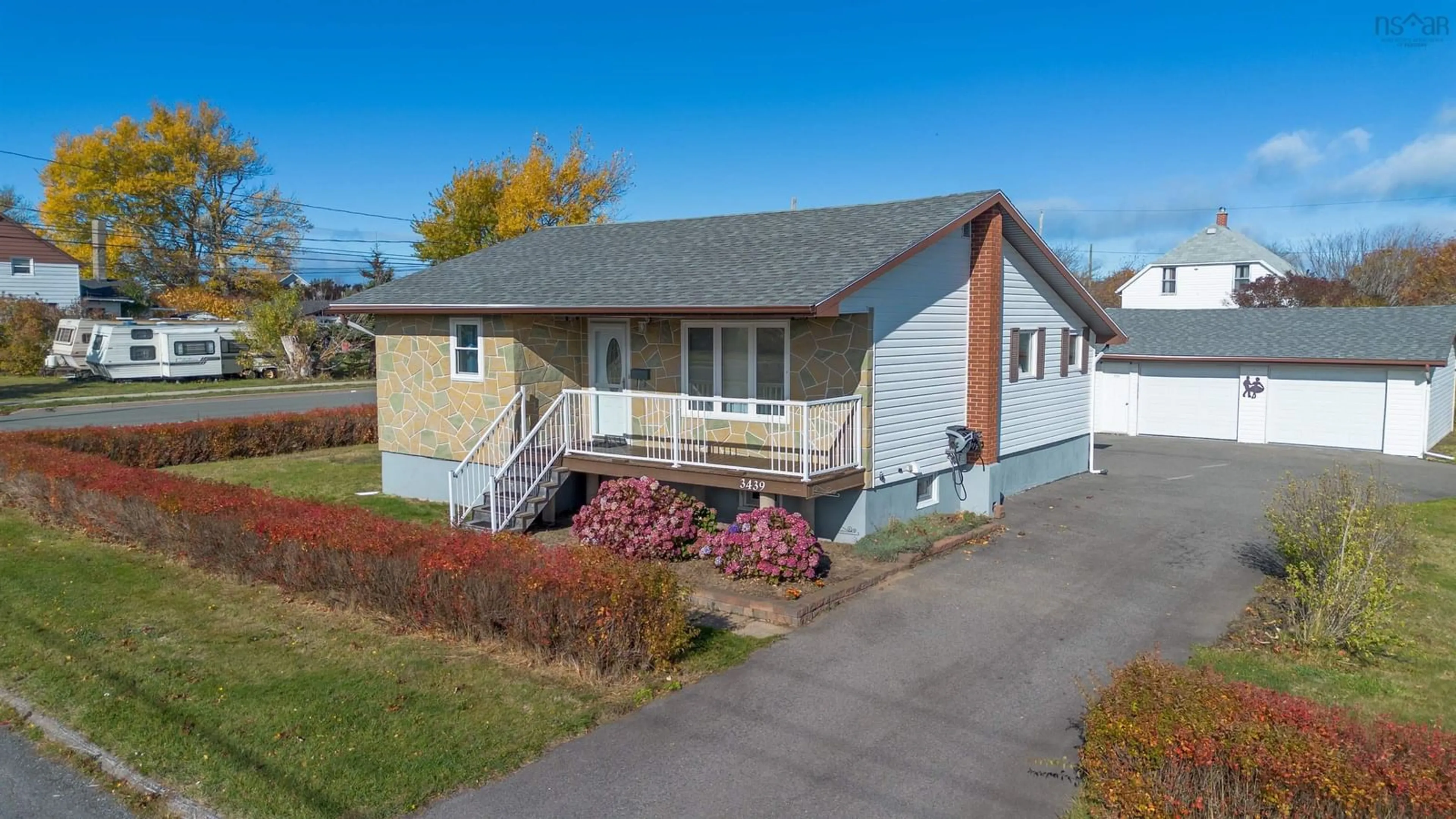 A pic from outside/outdoor area/front of a property/back of a property/a pic from drone, street for 3439 Duggan Ave, New Waterford Nova Scotia B1H 1P4