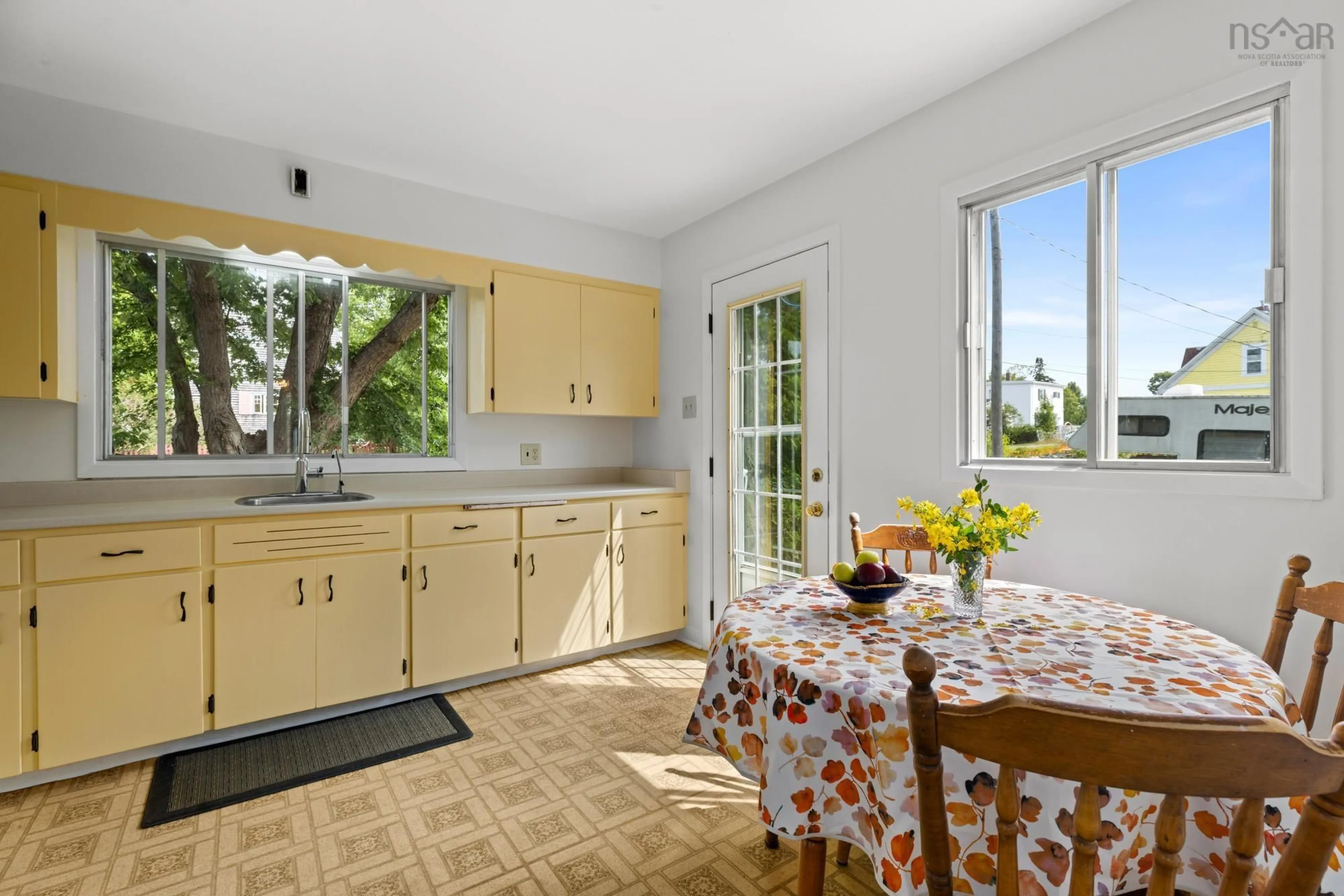 Standard kitchen, ceramic/tile floor for 1 Shore Rd, Herring Cove Nova Scotia B3V 1G6