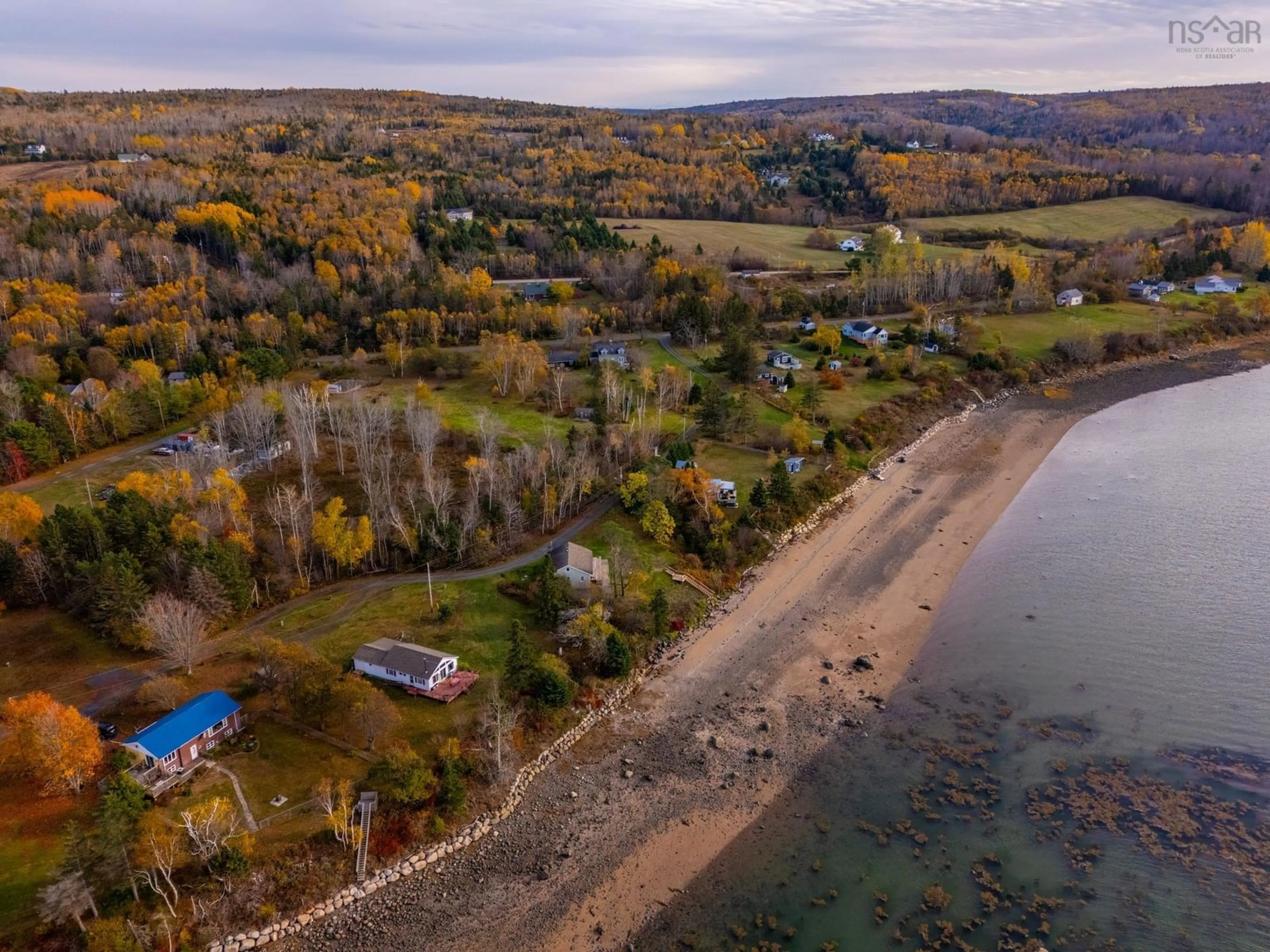 A pic from outside/outdoor area/front of a property/back of a property/a pic from drone, water/lake/river/ocean view for 55 White Cap Lane, Clementsport Nova Scotia B0S 1A0