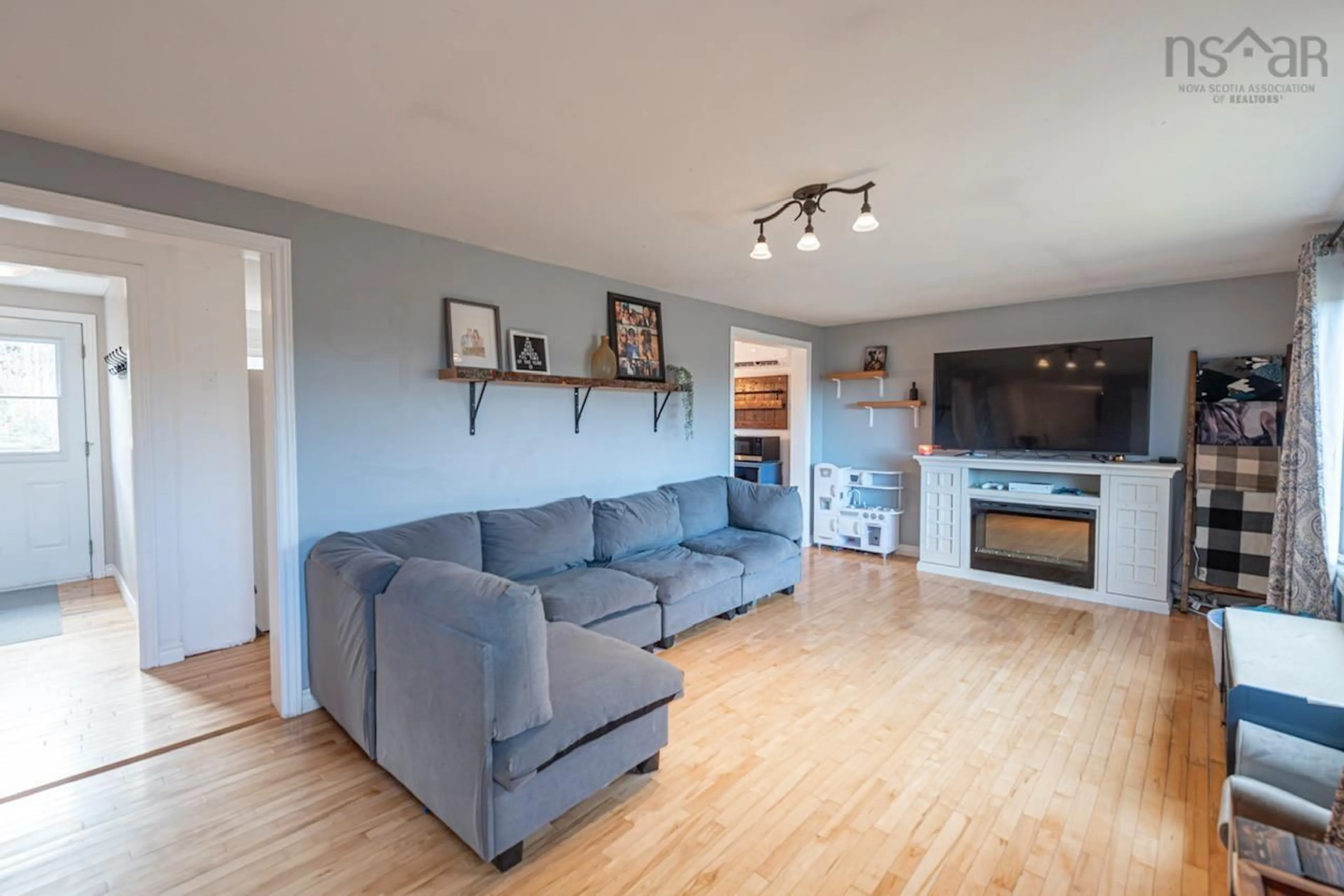 Living room with furniture, wood/laminate floor for 178 Linacy Rd, Linacy Nova Scotia B2H 5C4