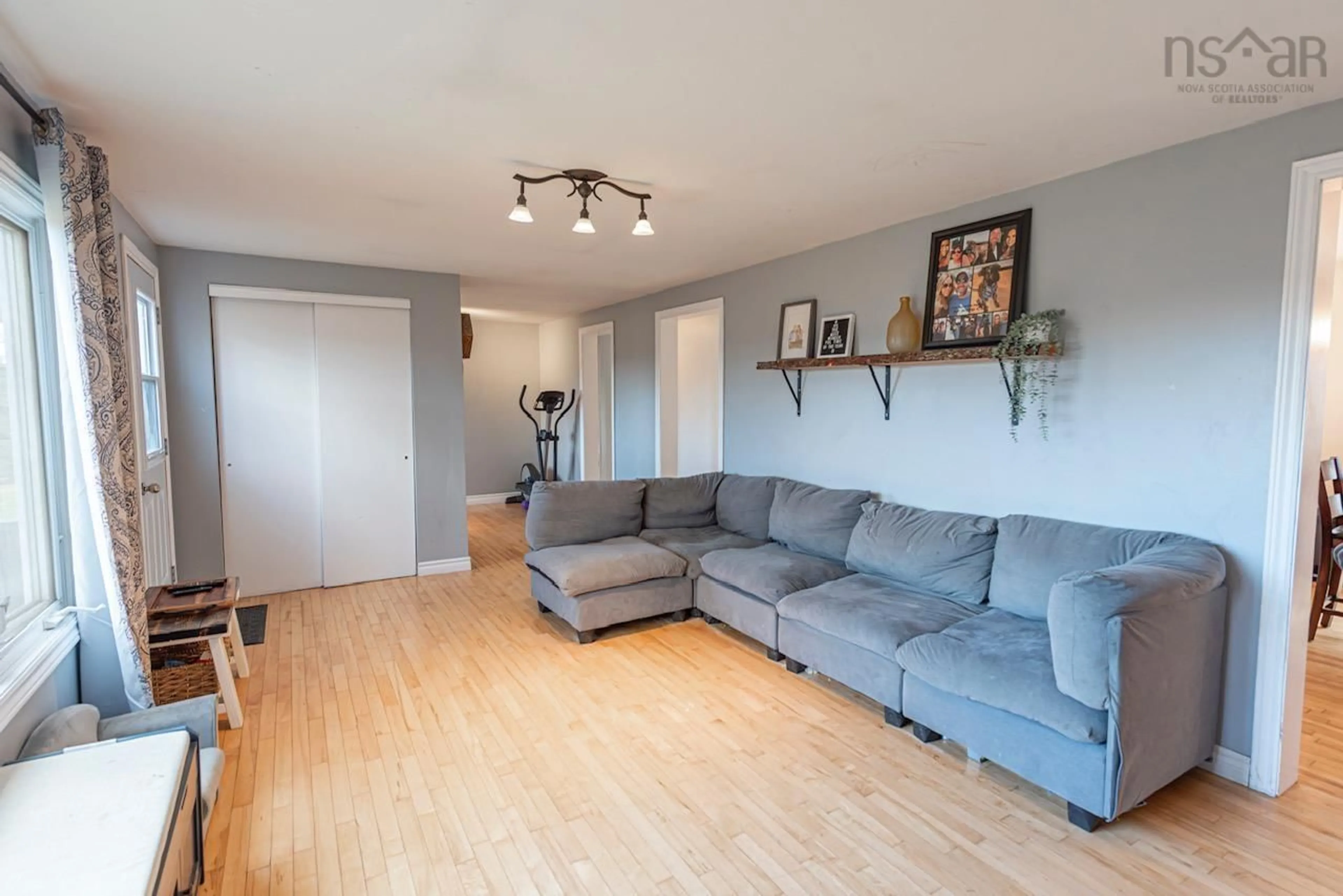 Living room with furniture, wood/laminate floor for 178 Linacy Rd, Linacy Nova Scotia B2H 5C4
