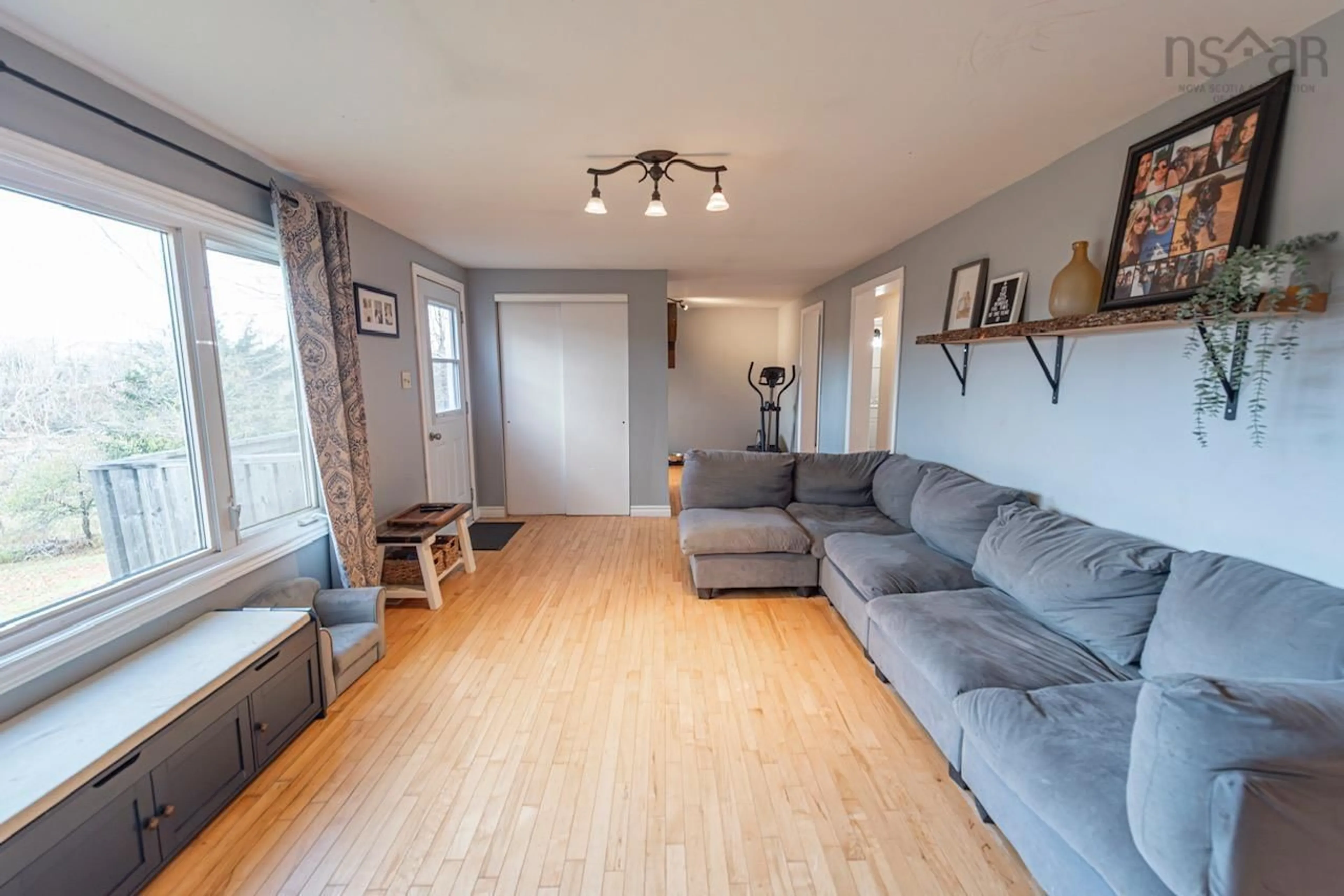 Living room with furniture, wood/laminate floor for 178 Linacy Rd, Linacy Nova Scotia B2H 5C4