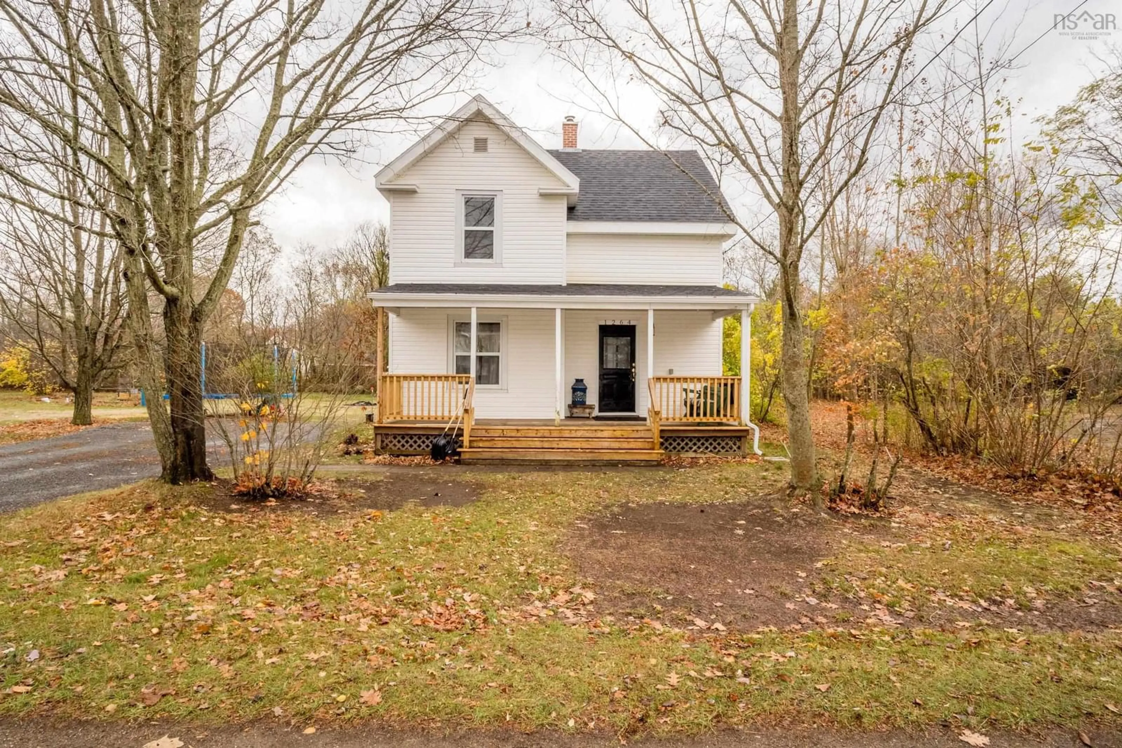 Home with vinyl exterior material, street for 1264 Mill St, Waterville Nova Scotia B0P 1V0