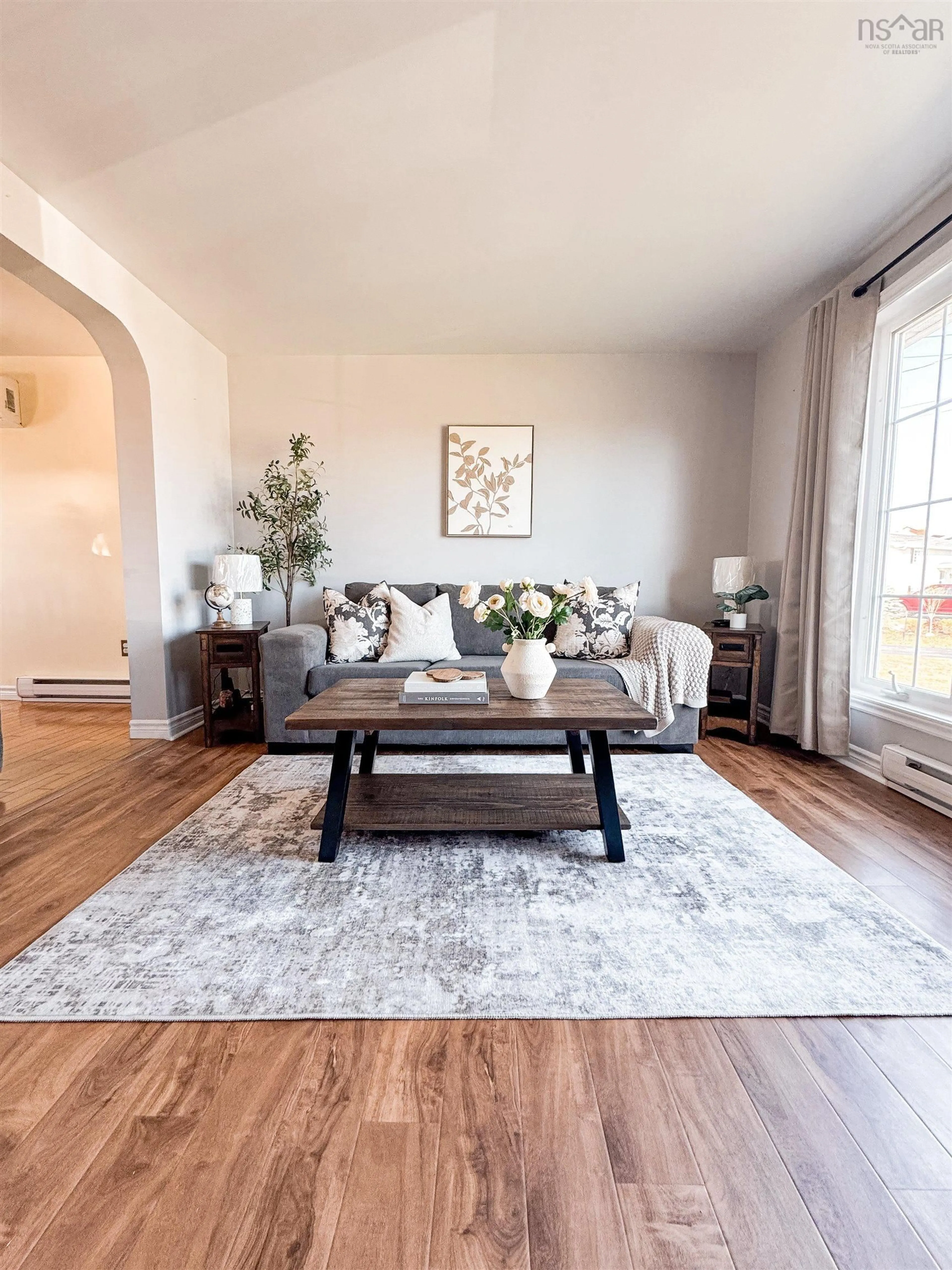 Living room with furniture, wood/laminate floor for 40 Wentworth Cir, Eastern Passage Nova Scotia B3G 1G1