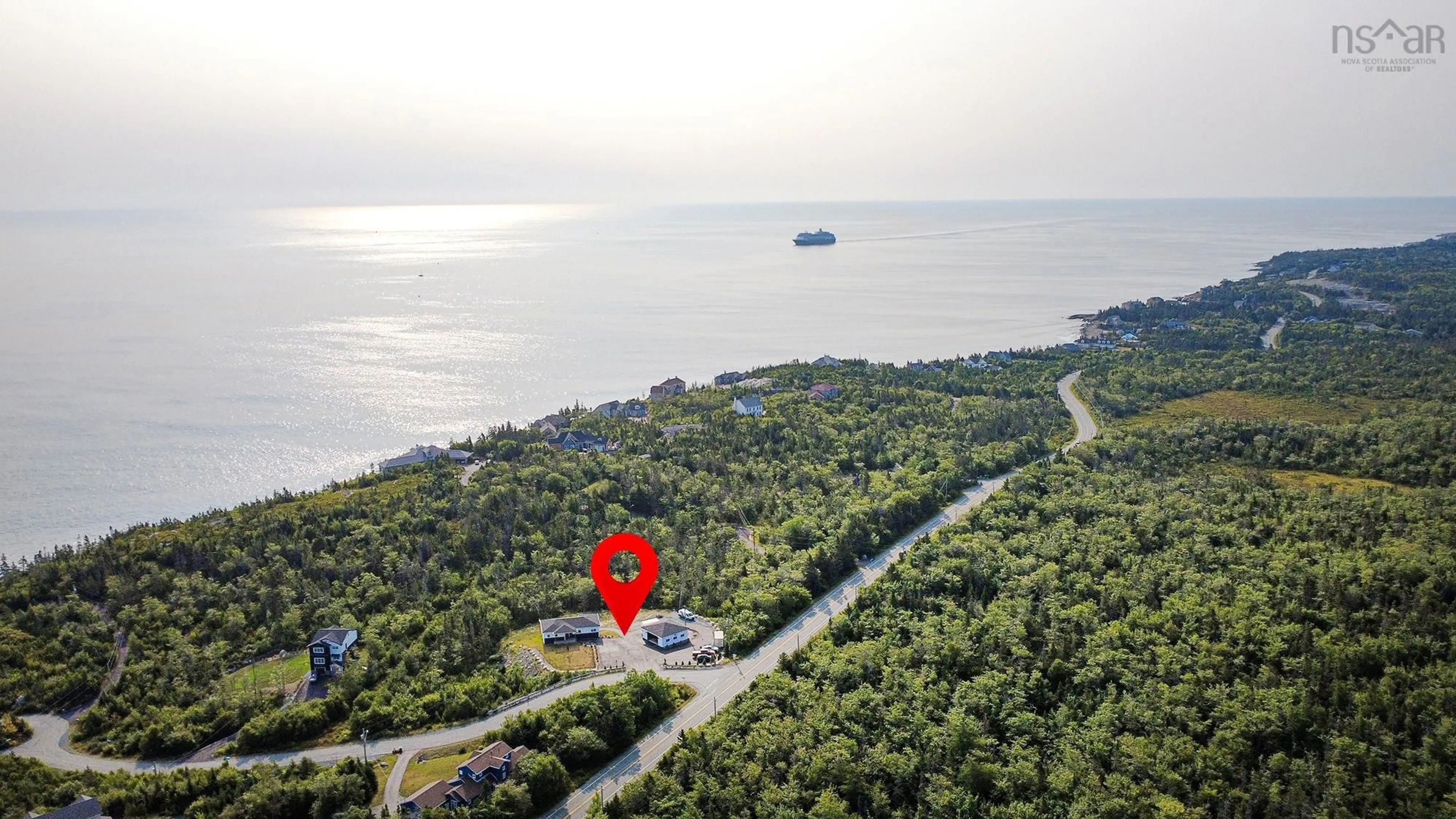 A pic from outside/outdoor area/front of a property/back of a property/a pic from drone, water/lake/river/ocean view for 3 Kittiwake Ridge, Halibut Bay Nova Scotia B2V 1R1