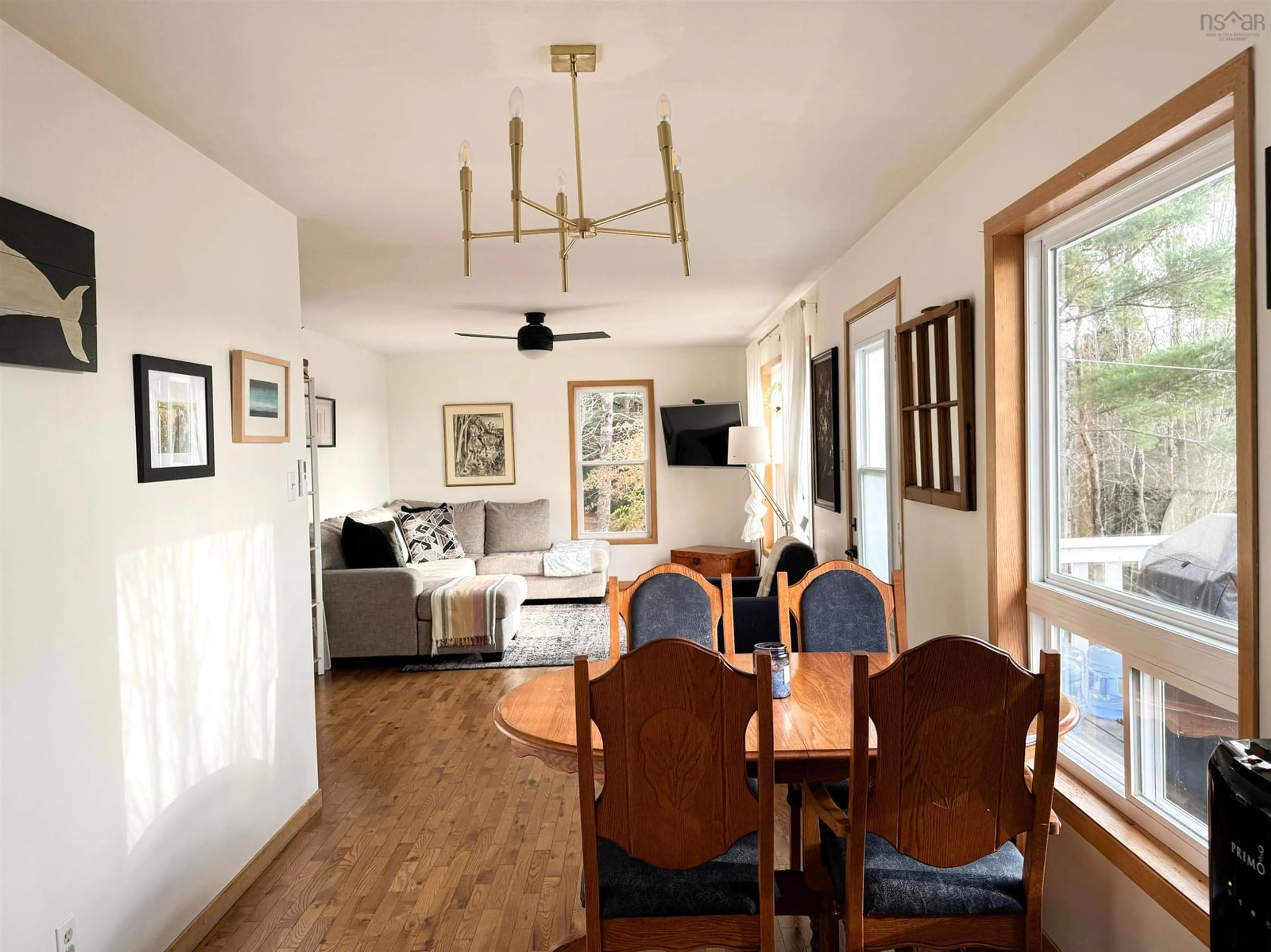 Dining room, wood/laminate floor for 9575 Highway 3 Rte, Maders Cove Nova Scotia B0J 2E0