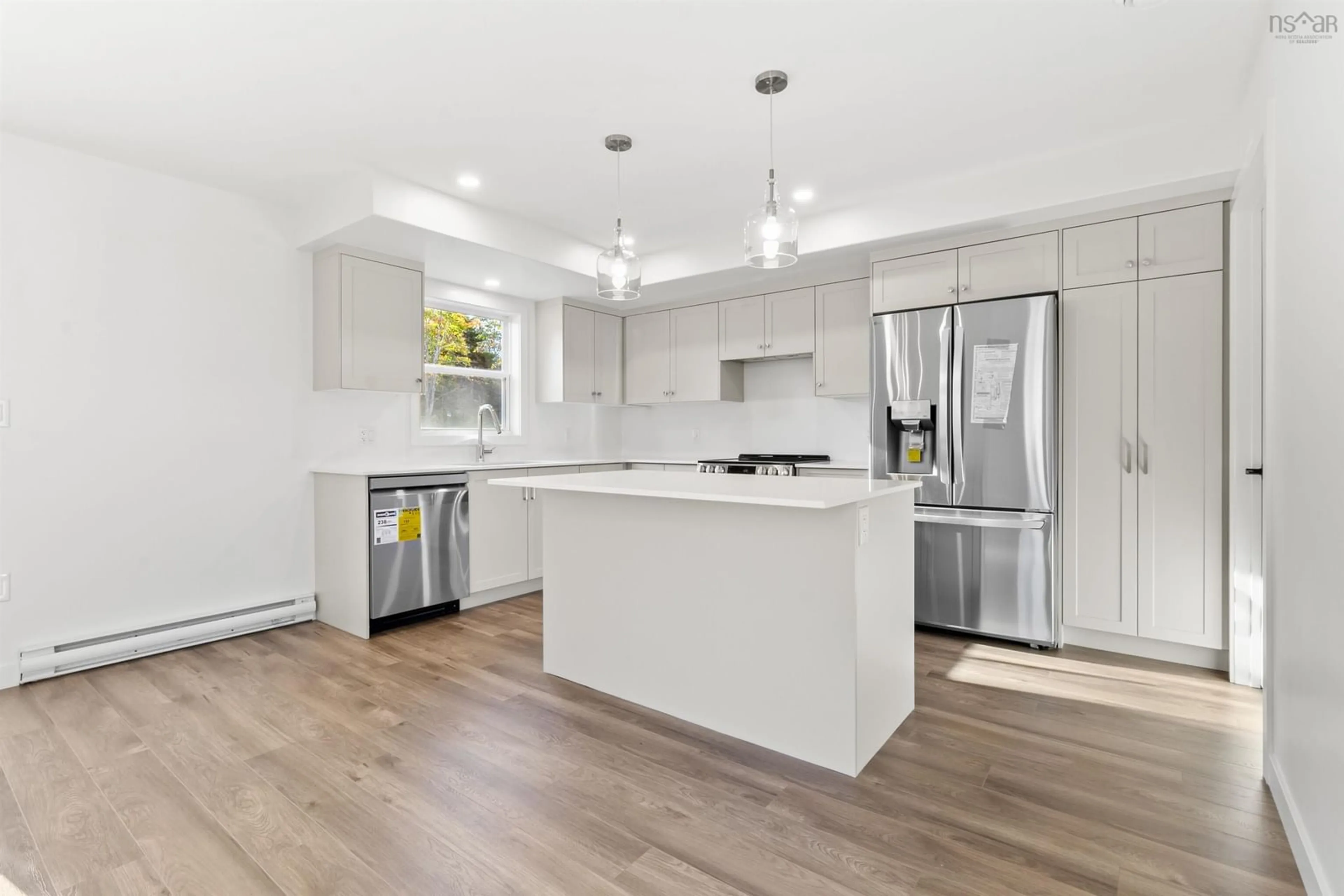 Open concept kitchen, wood/laminate floor for 28 Simona Dr, Dartmouth Nova Scotia B2X 2E1