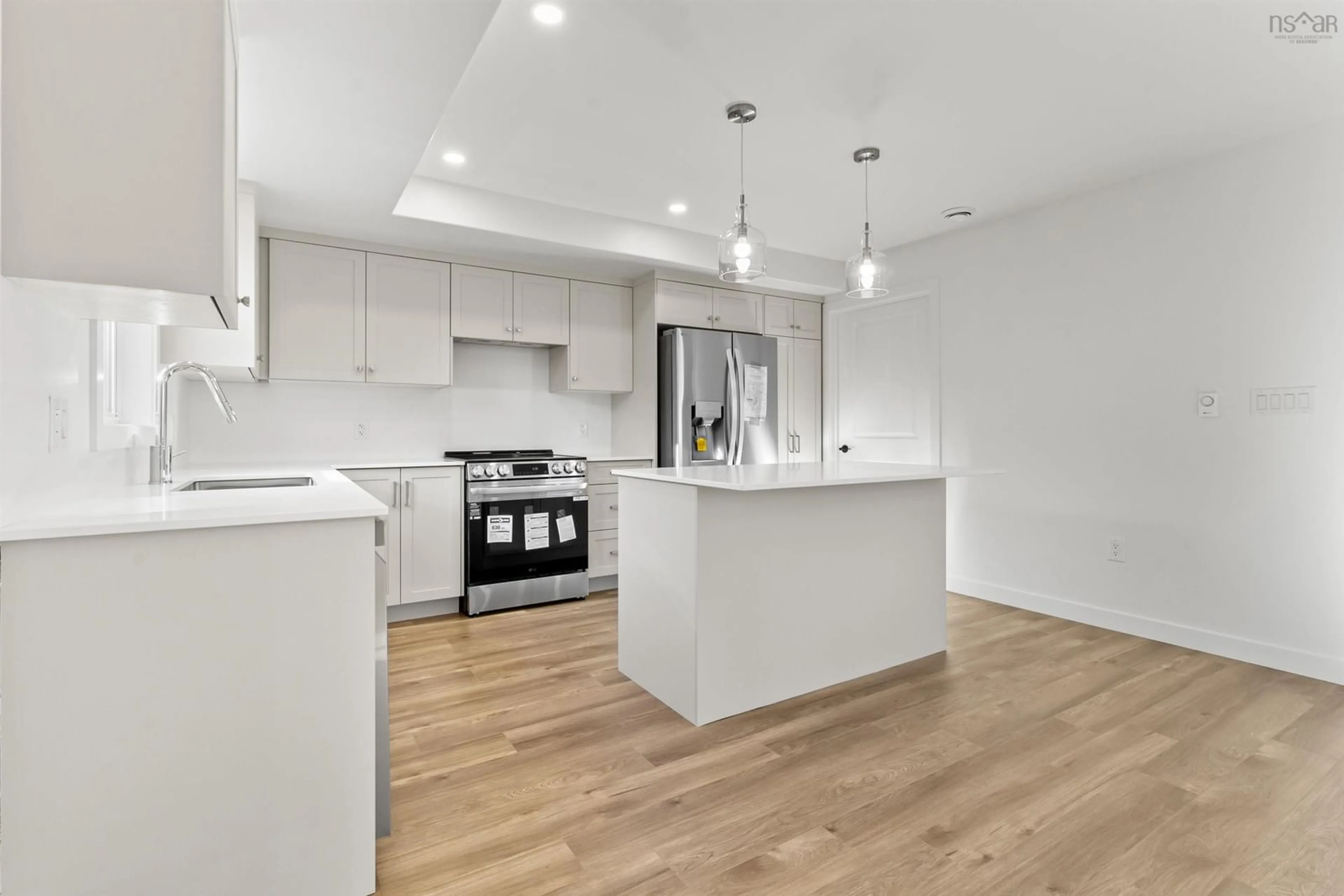 Open concept kitchen, wood/laminate floor for 28 Simona Dr, Dartmouth Nova Scotia B2X 2E1