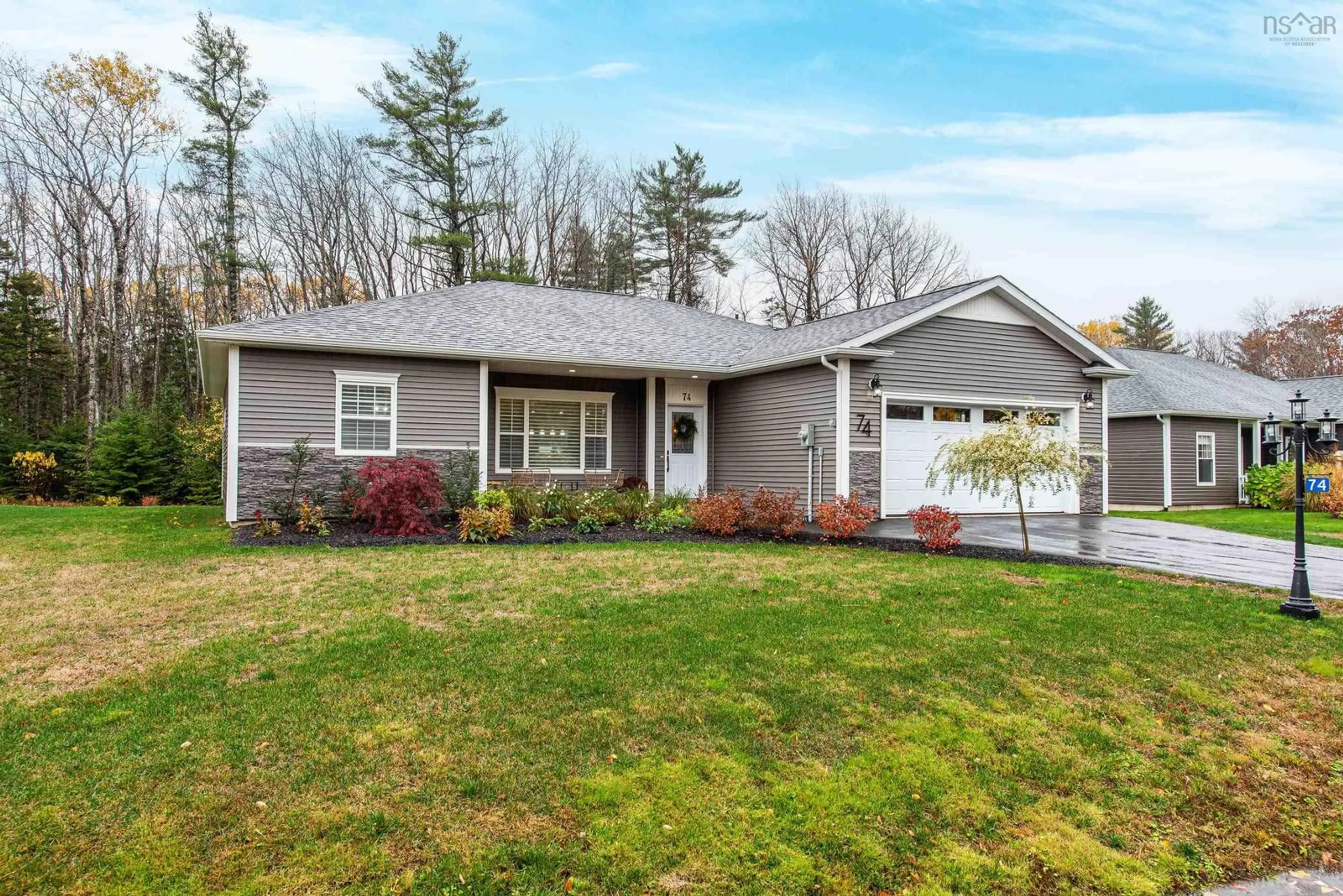 Home with vinyl exterior material, street for 74 Lauren Dr, Centreville Nova Scotia B0P 1J0