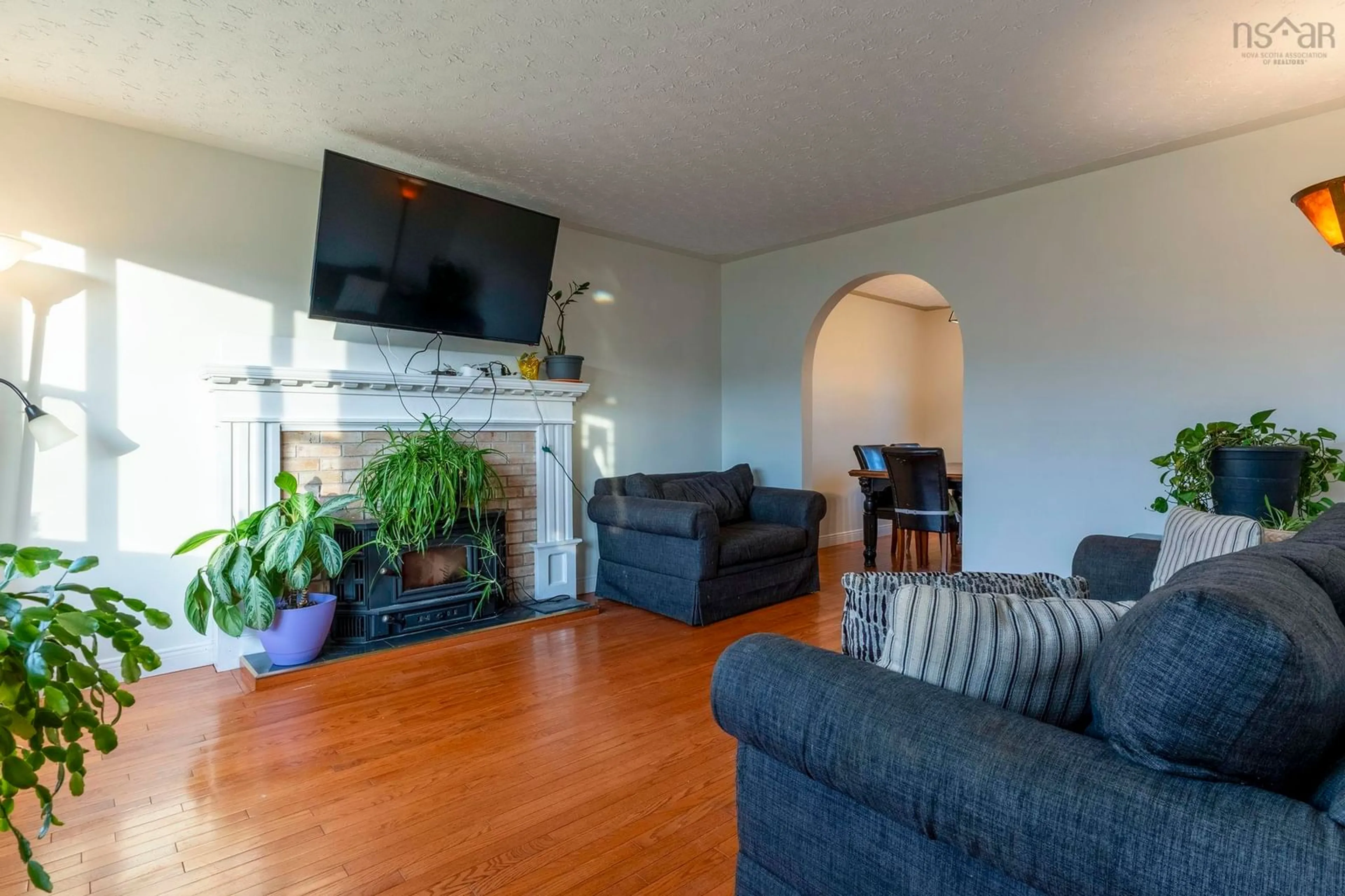 Living room with furniture, wood/laminate floor for 22 Carisbrooke Lane, Cole Harbour Nova Scotia B2V 1R2