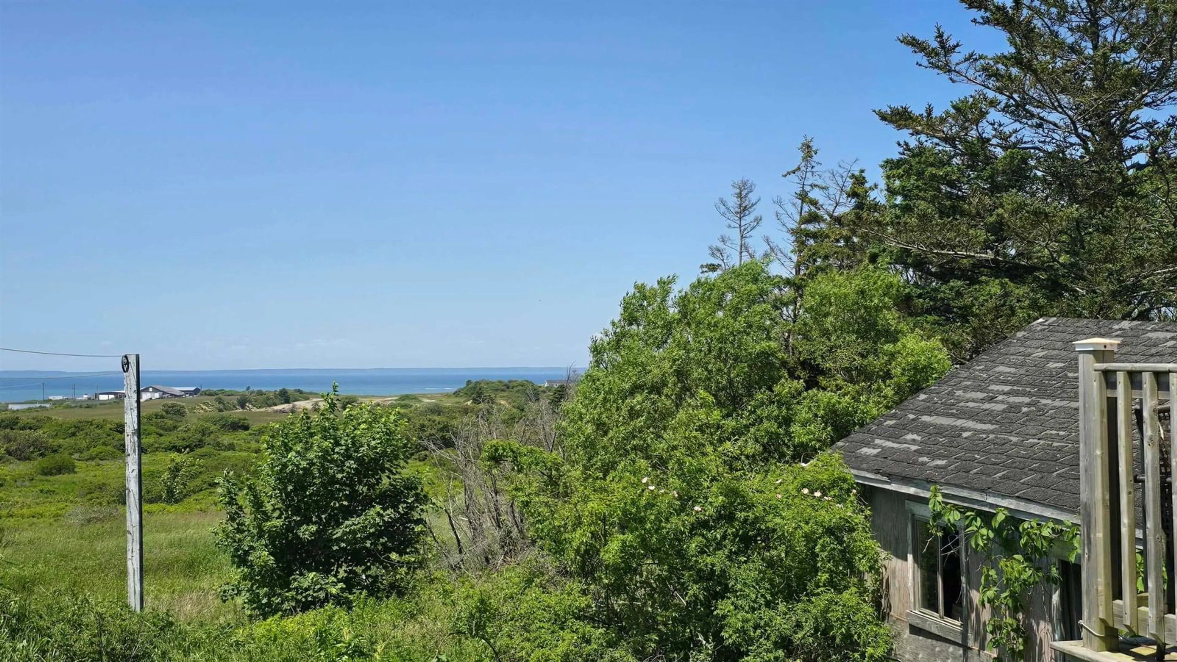 A pic from outside/outdoor area/front of a property/back of a property/a pic from drone, water/lake/river/ocean view for 8599 Highway 1, Meteghan Centre Nova Scotia B0W 2K0