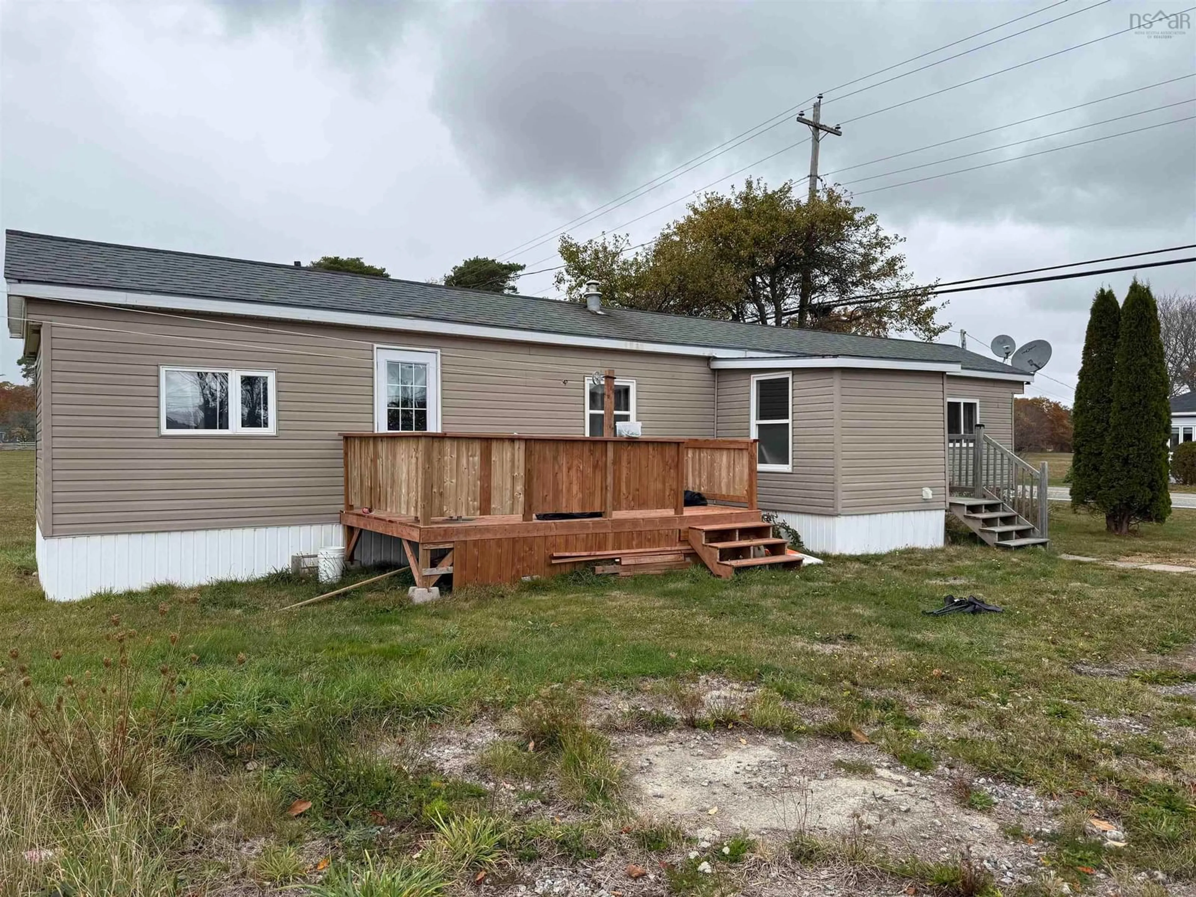 A pic from outside/outdoor area/front of a property/back of a property/a pic from drone, unknown for 82 Port Clyde Rd, Clyde River Nova Scotia B0W 1E0