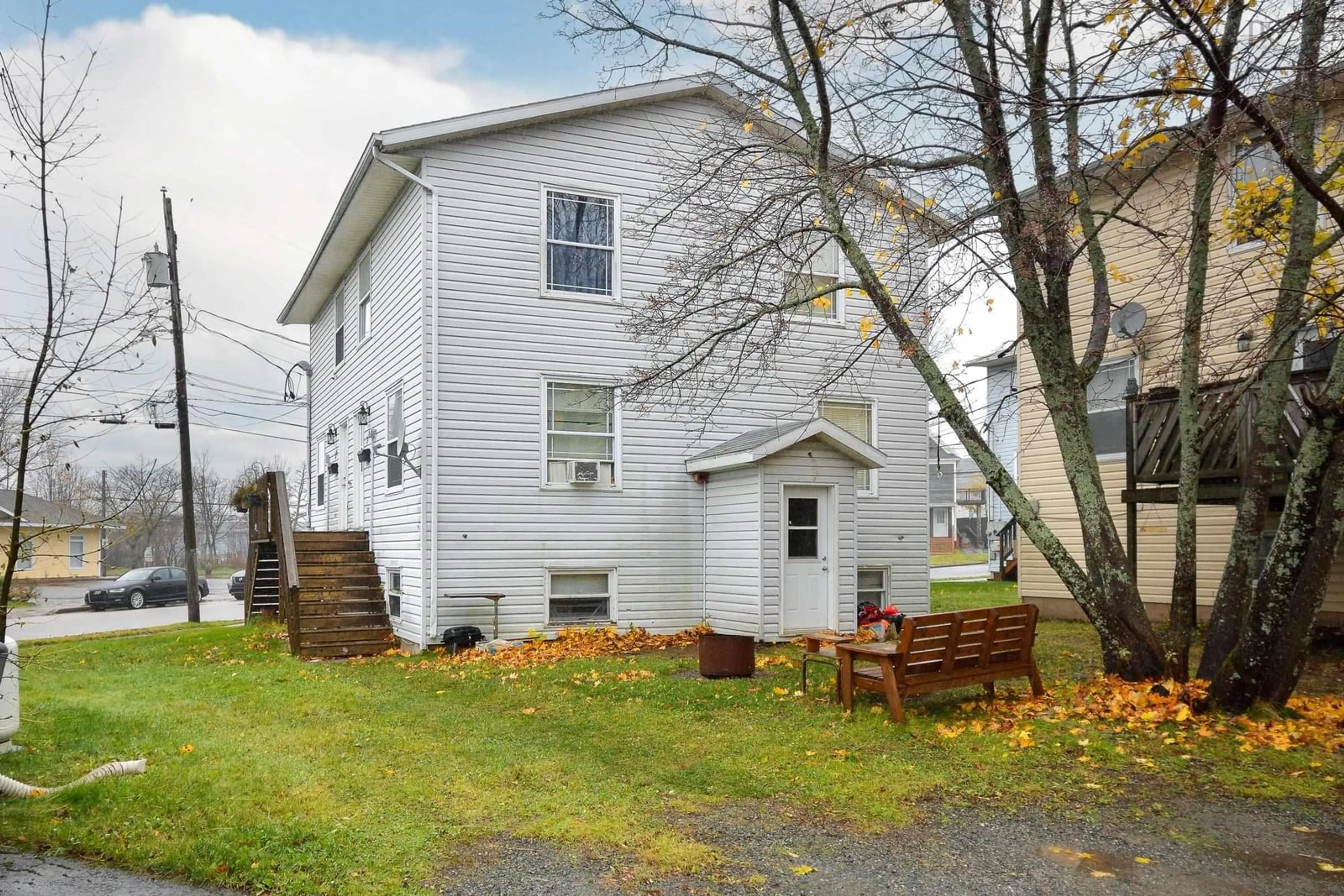 Home with vinyl exterior material, street for 318 Townsend St, Sydney Nova Scotia B1P 5G2