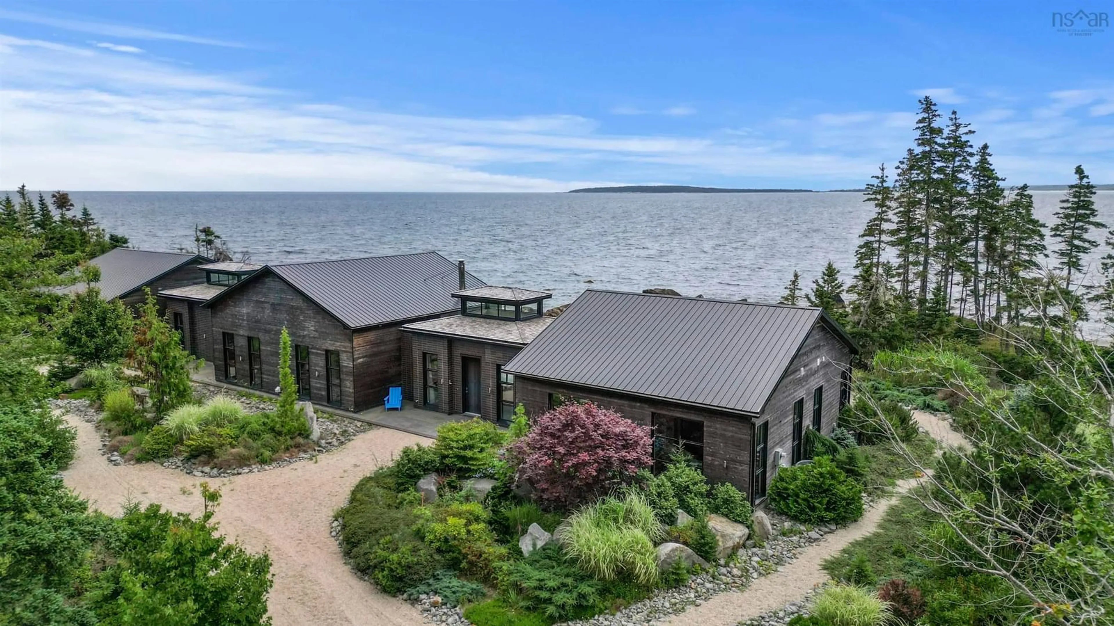 A pic from outside/outdoor area/front of a property/back of a property/a pic from drone, water/lake/river/ocean view for 6999 Highway 3, Hunts Point Nova Scotia B0T 1G0