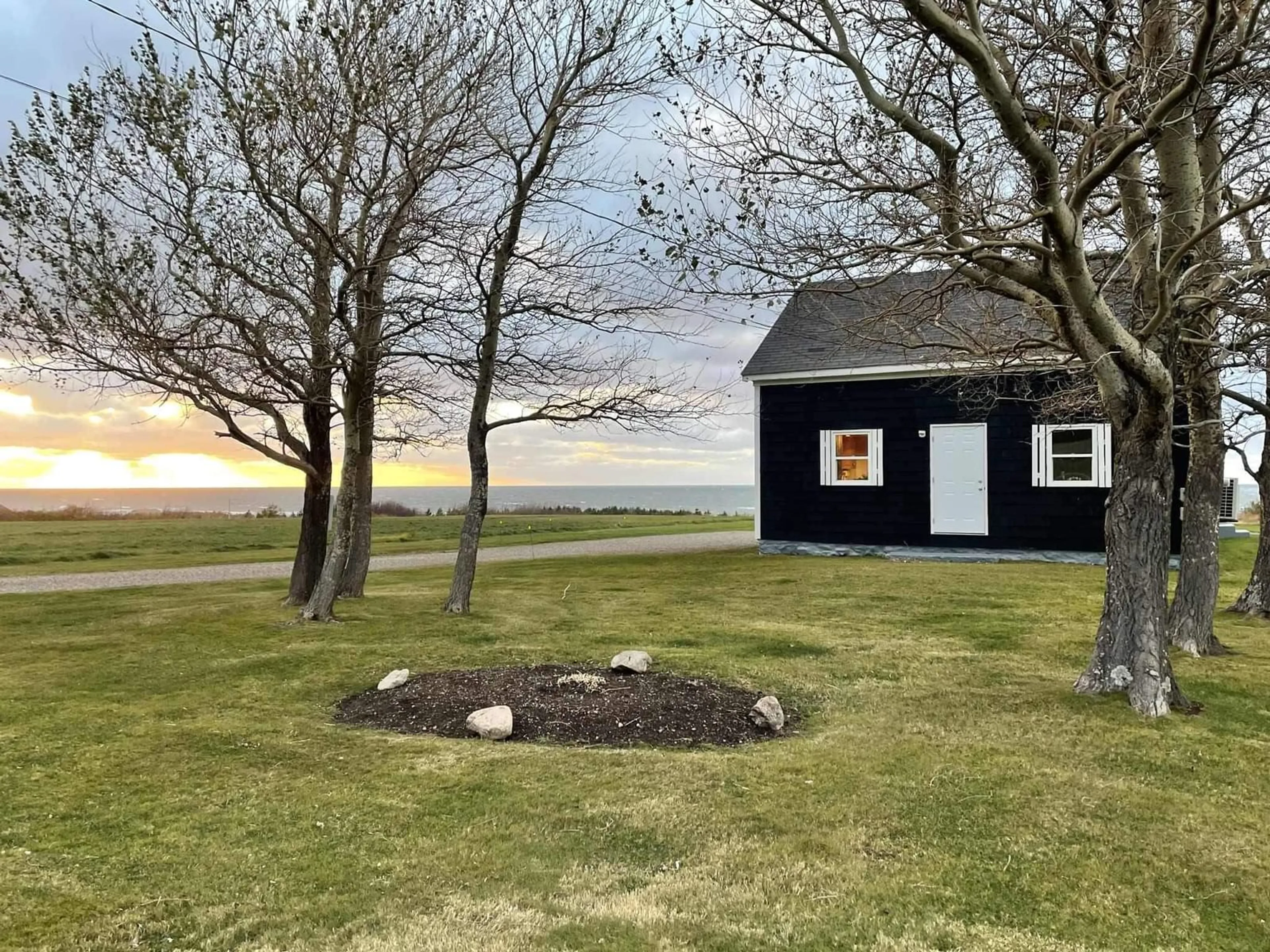 A pic from outside/outdoor area/front of a property/back of a property/a pic from drone, water/lake/river/ocean view for 13763 Cabot Trail, Point Cross Nova Scotia B0E 1H0