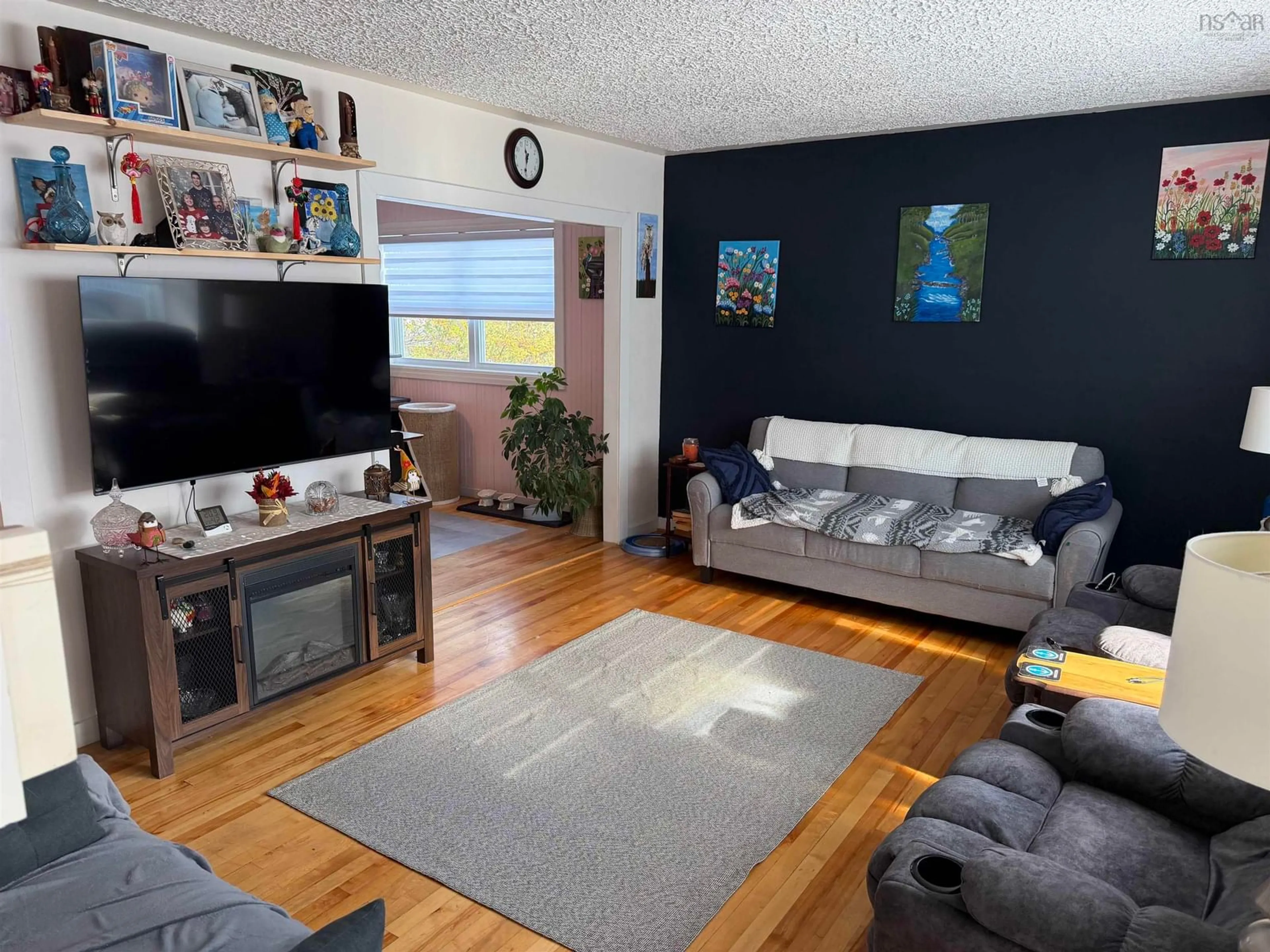 Living room with furniture, wood/laminate floor for 365 Bennett St, New Glasgow Nova Scotia B2H 1X3