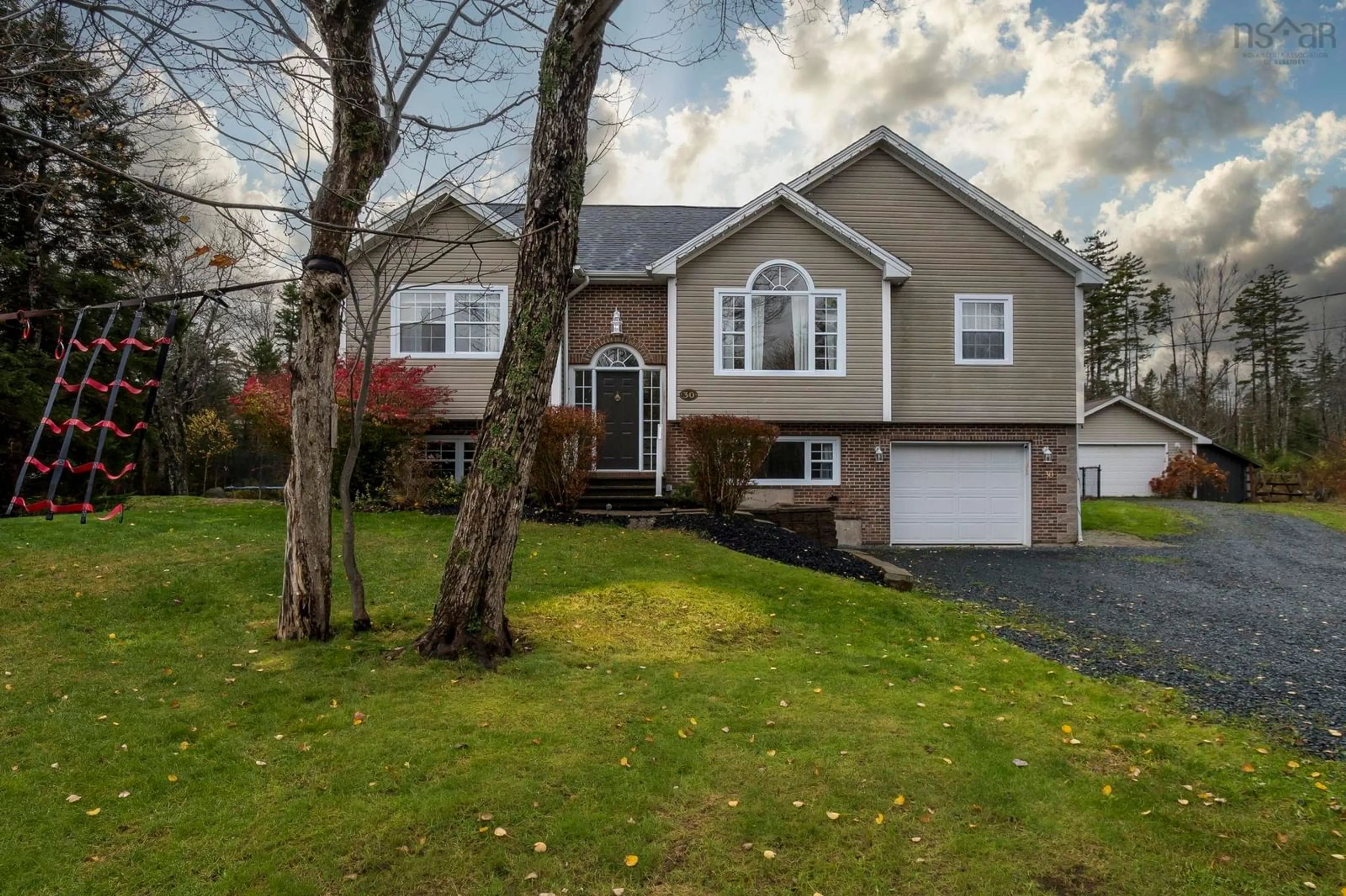 Home with vinyl exterior material, street for 30 Mohawk St, Hammonds Plains Nova Scotia B4B 1M7